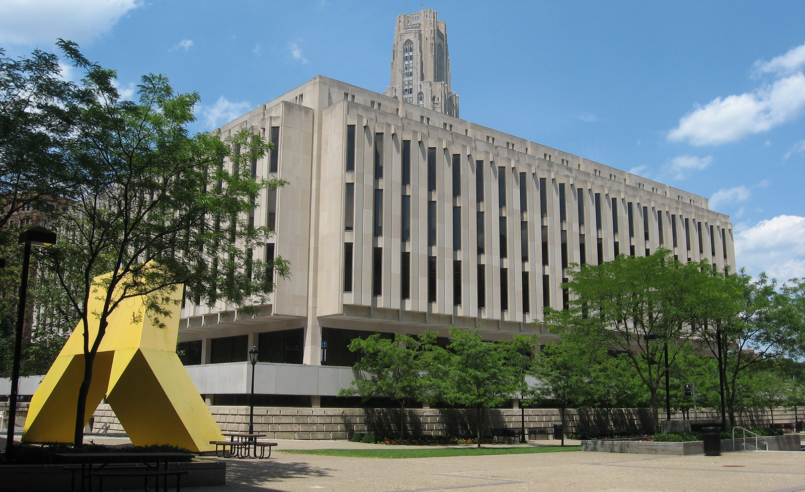 University of Pittsburgh's Hillman Library exterior; a large sculpture to the left.