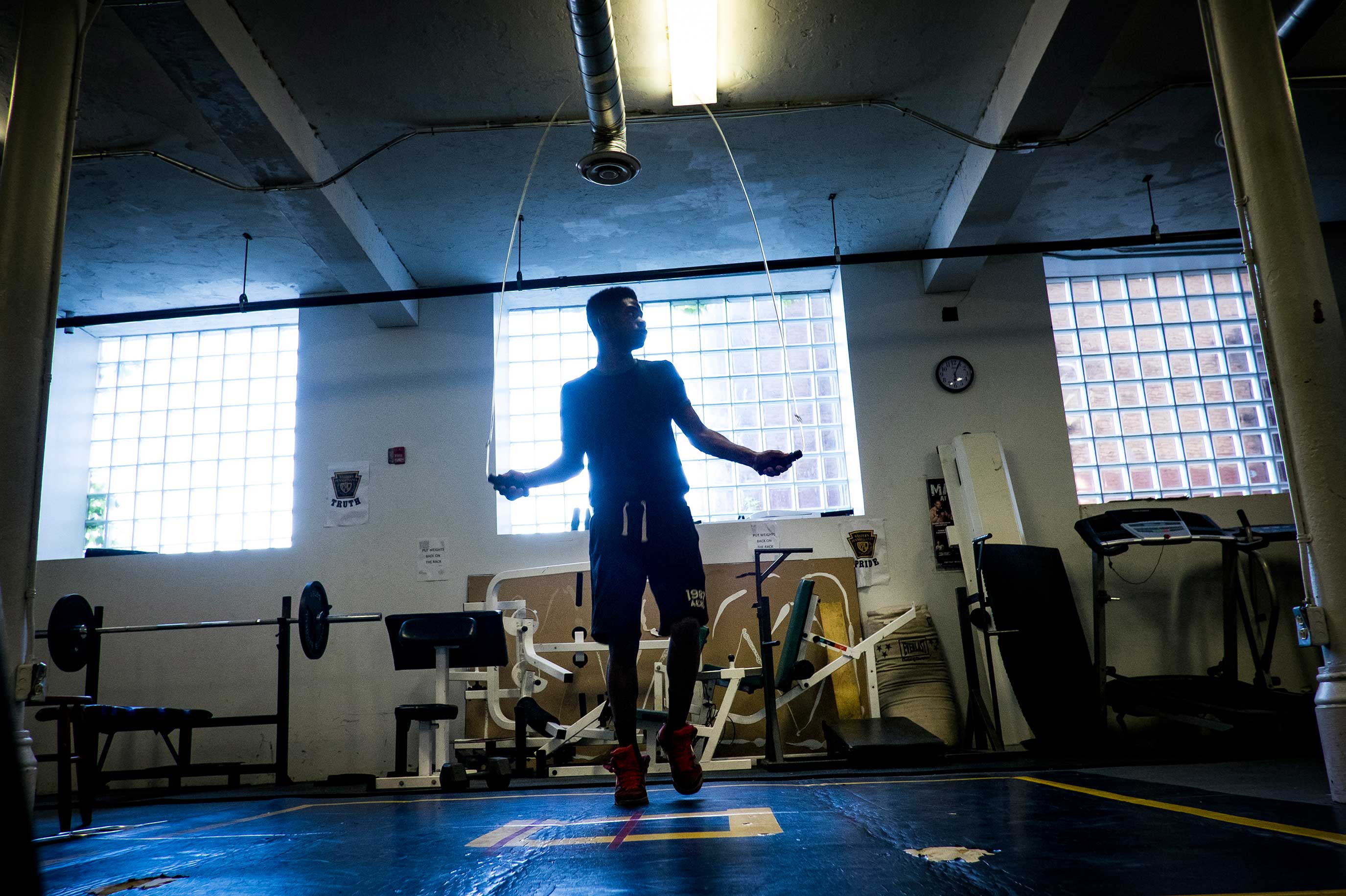 A young man jumps rope in the Western Pennsylvania branch of the Police Athletic League, which runs a boxing program in the basement of the Braddock Community Center.