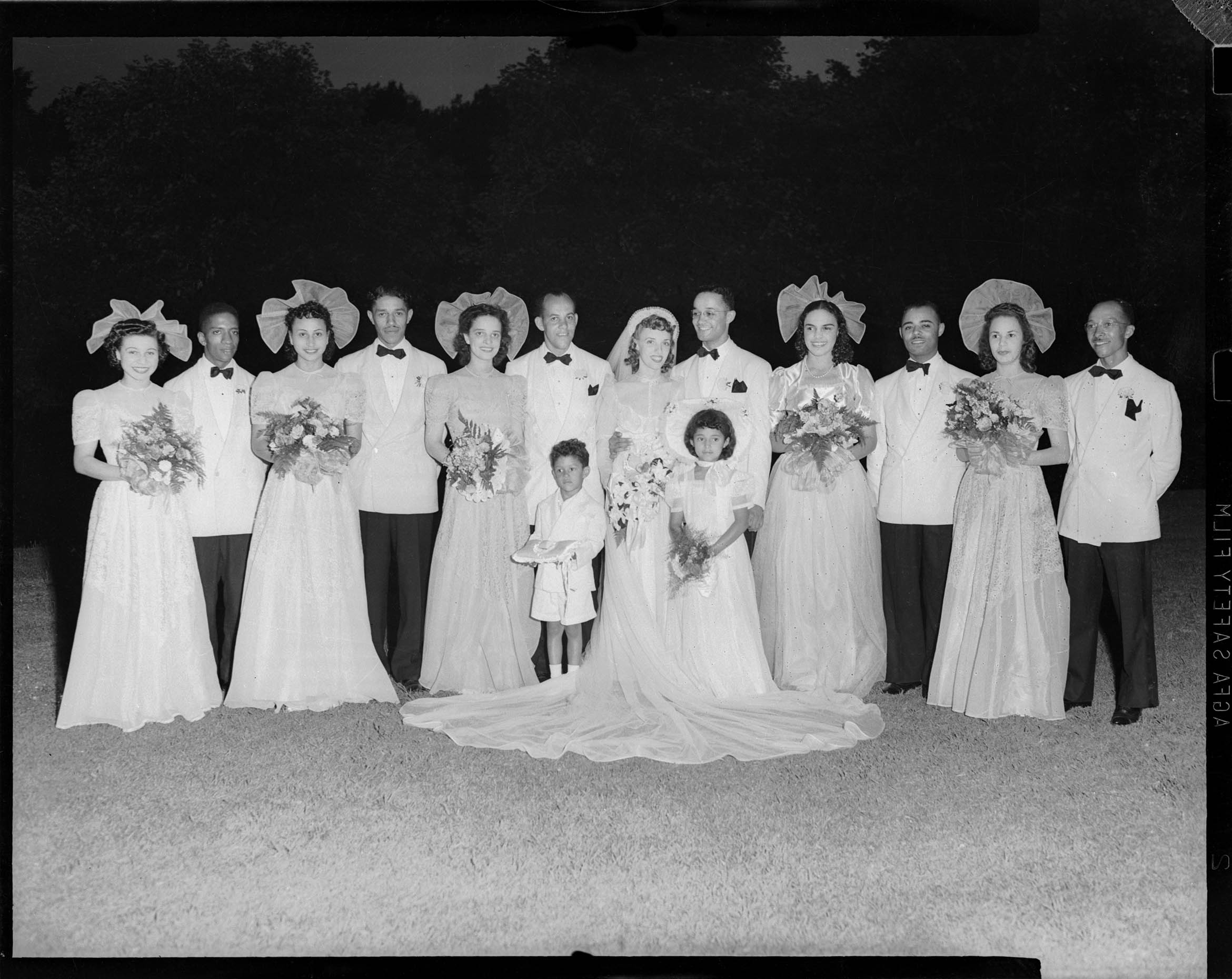 Charles Teenie Harris, Group portrait of wedding party, posed in yard possibly on Chalfont Street, July 25, 1942, Heinz Family Fund
