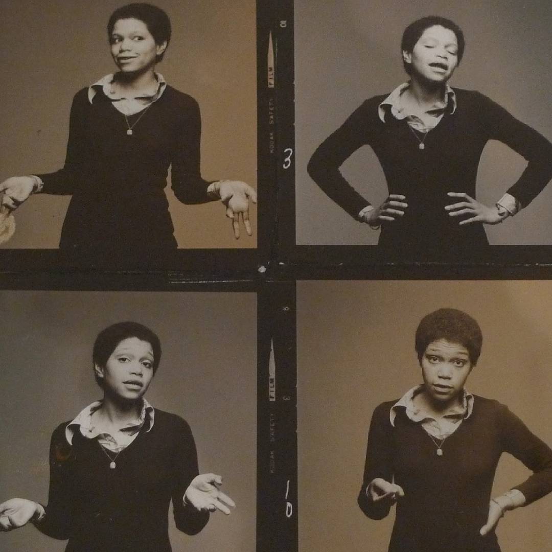 Four panels of Linda Goode Bryant, seemingly talking at the camera, gesturing with her hands.