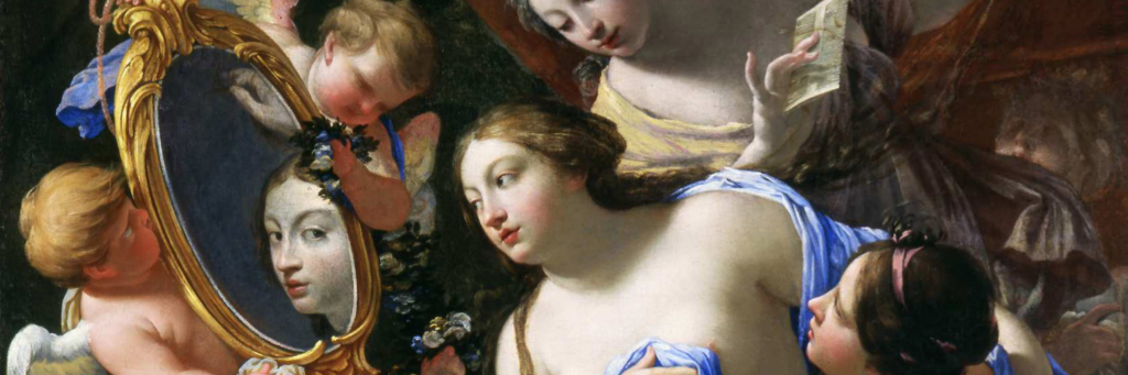 Painting of seated Venus, looking into a mirror. Her reflection gazes directly at the viewer