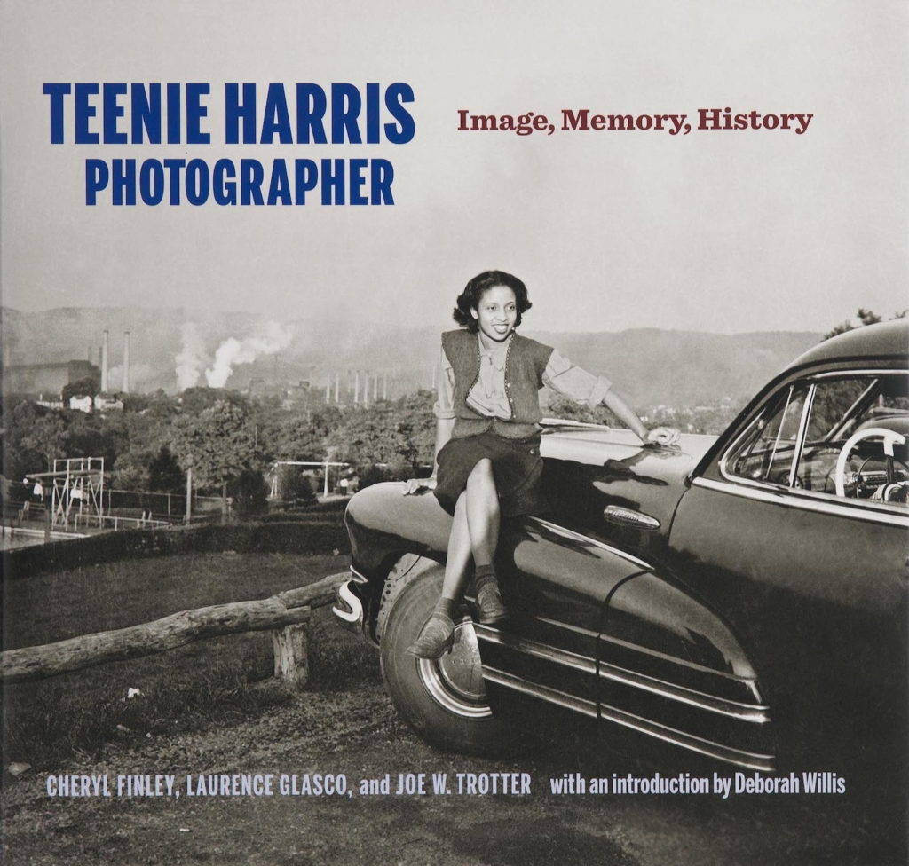 Book cover with woman seated on car overlooking landscape and text Teenie Harris, Photographer: Image, Memory, History