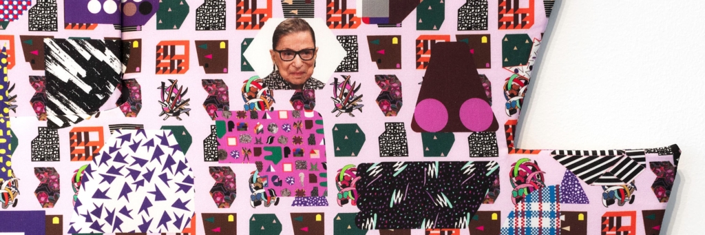 A colorful pattern of repeating geometric shapes; nestled among these shapes is a small picture of Ruth Bader Ginsburg.