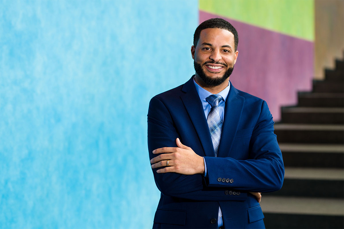 Staff headshot of Jason Segreti in the museum lobby