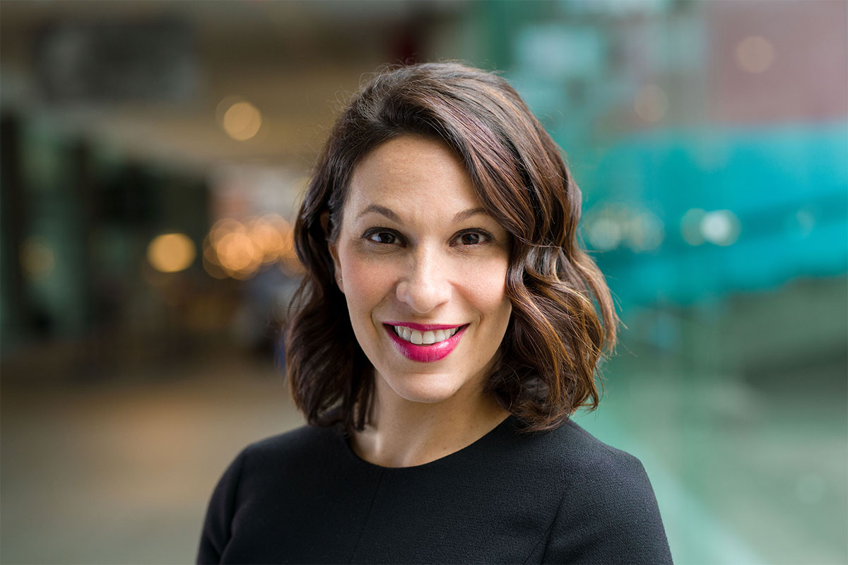 Staff headshot of Stefanie Mohr in the lobby of the museum