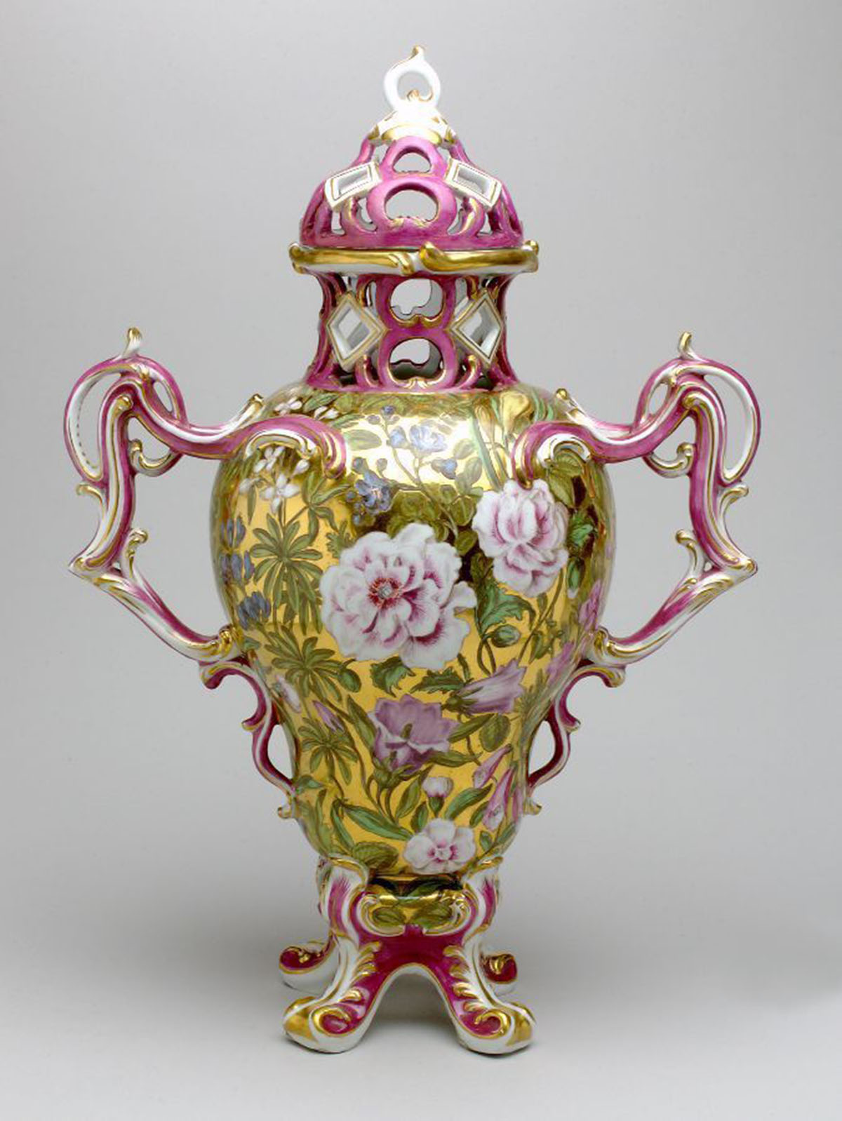 A porcelain vase with enamel and gilded decoration.