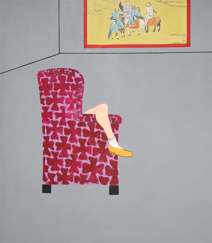 A painting depicts a high-back chair facing a wall. A woman’s leg wearing a sock and ballet flat hangs over the arm of the chair. On the wall, a painting is hung depicting a group of horsemen in a desert.