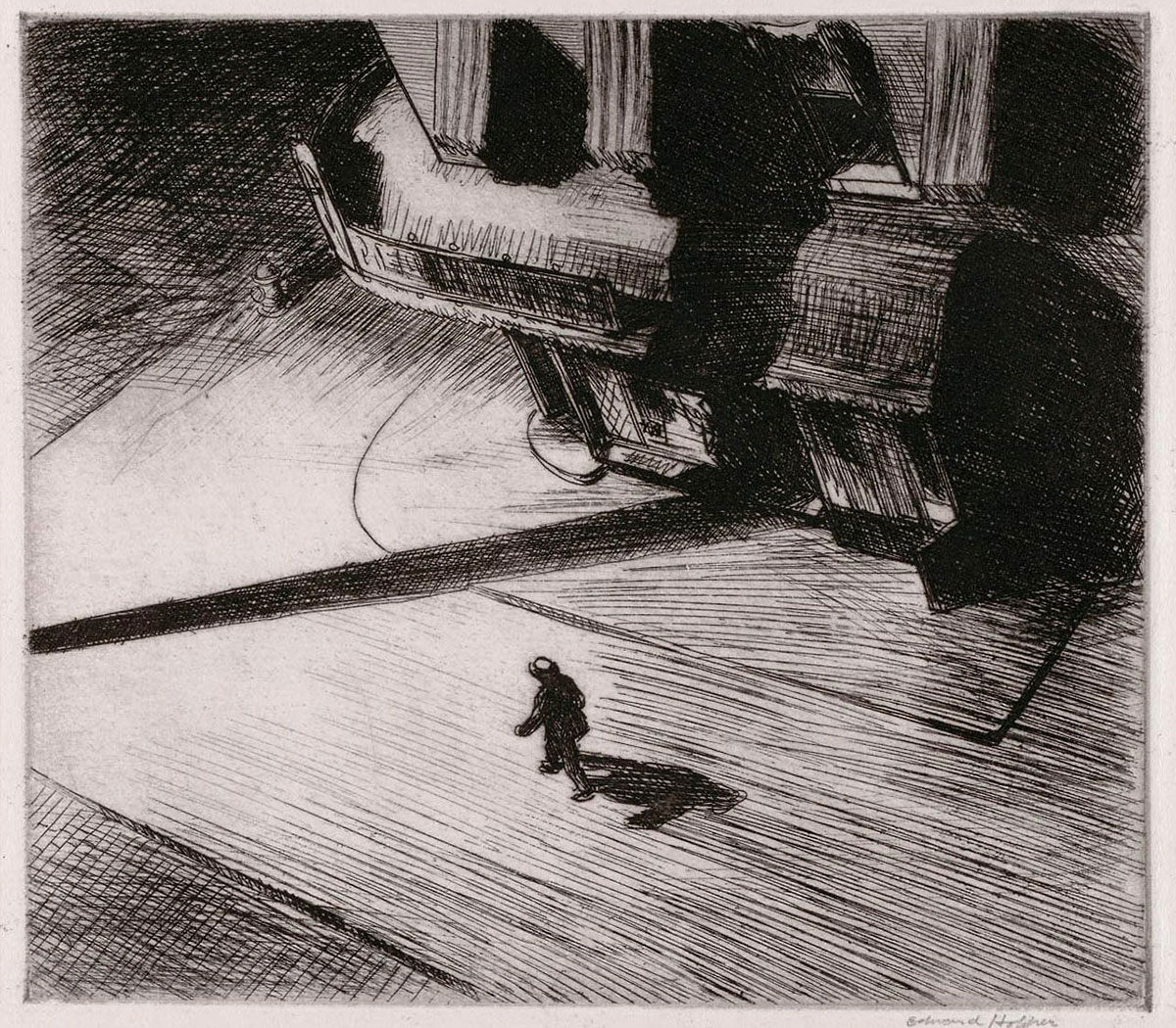 A lone figure walks down a sidewalk at night, passing a dark storefront; a long shadow is cast across the scene by a lamppost