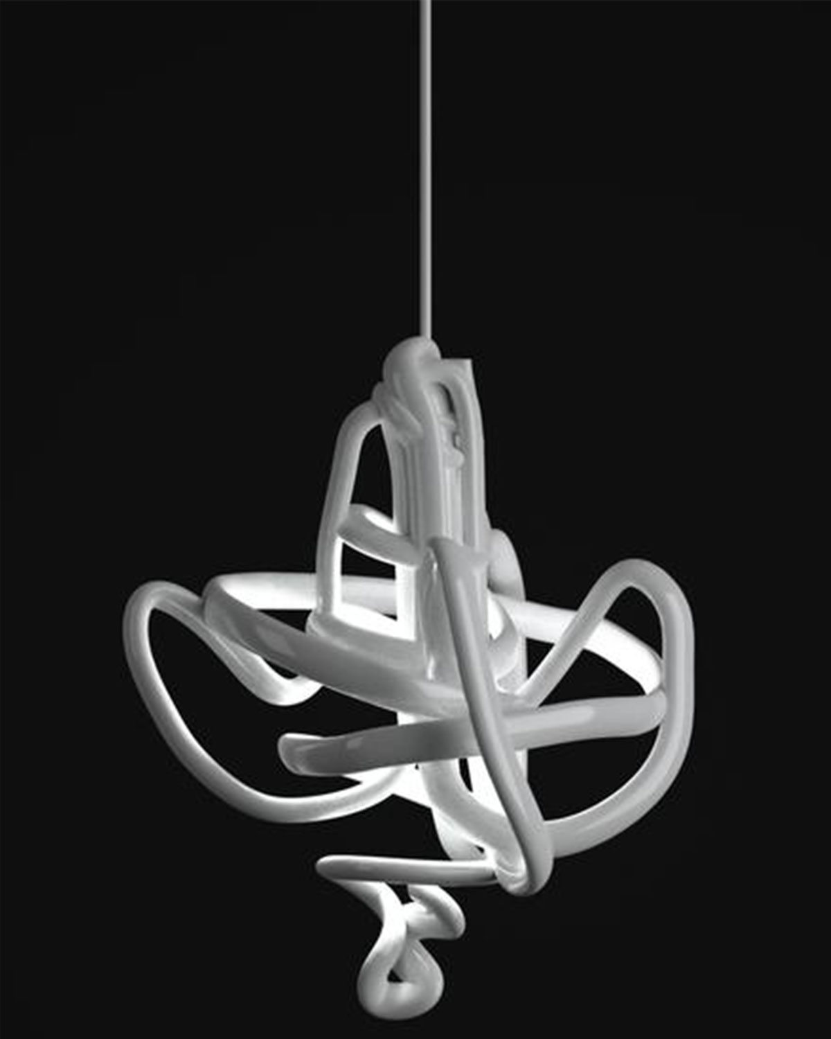 An abstract chandelier made of twisted, bent white plastic tubing