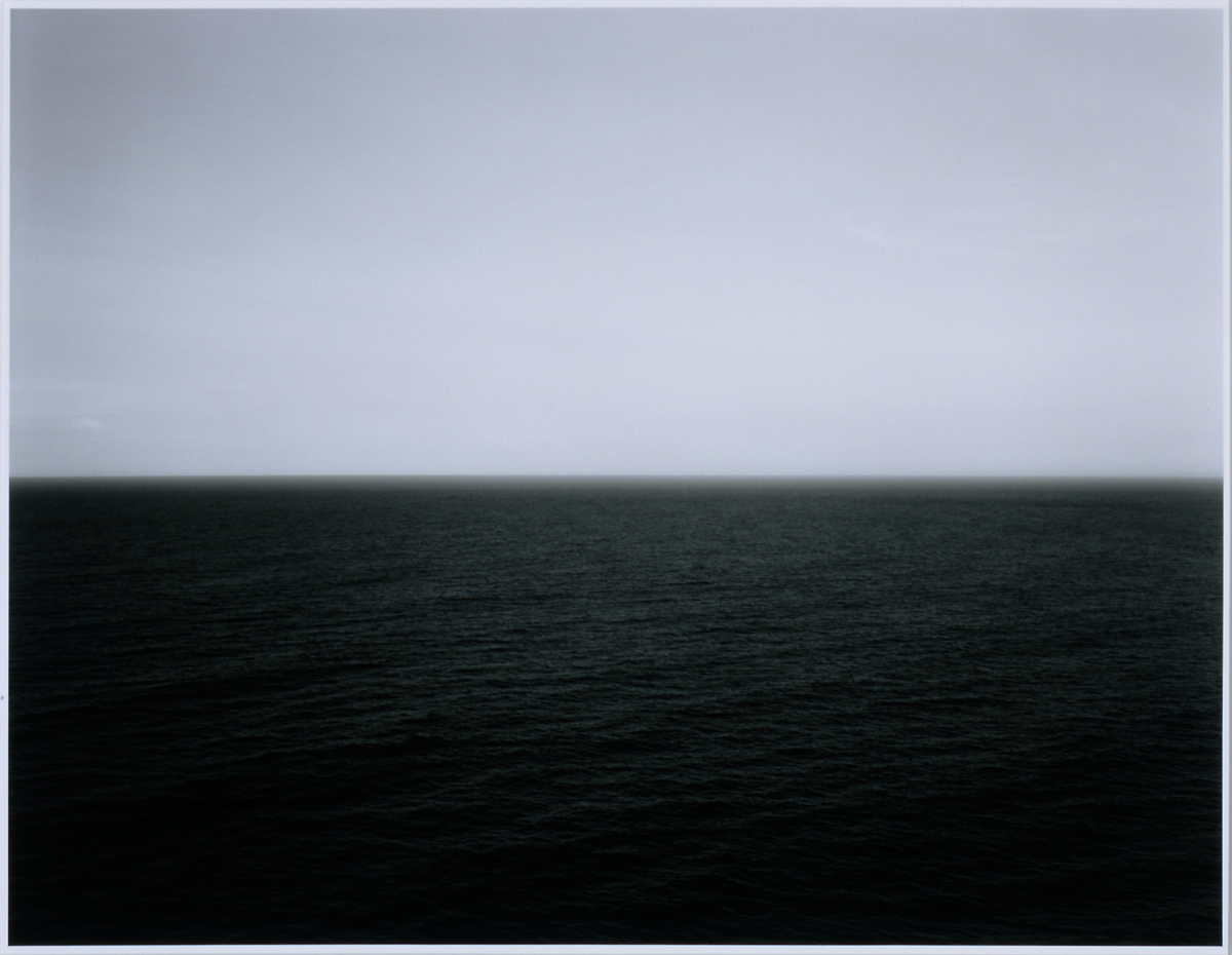 The horizon line where the sea meets the sky.