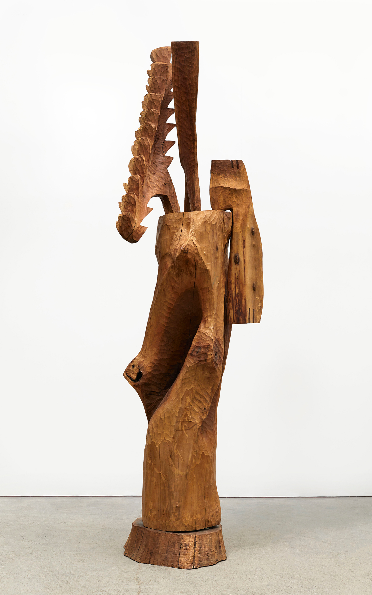 An abstract wooden sculpture.