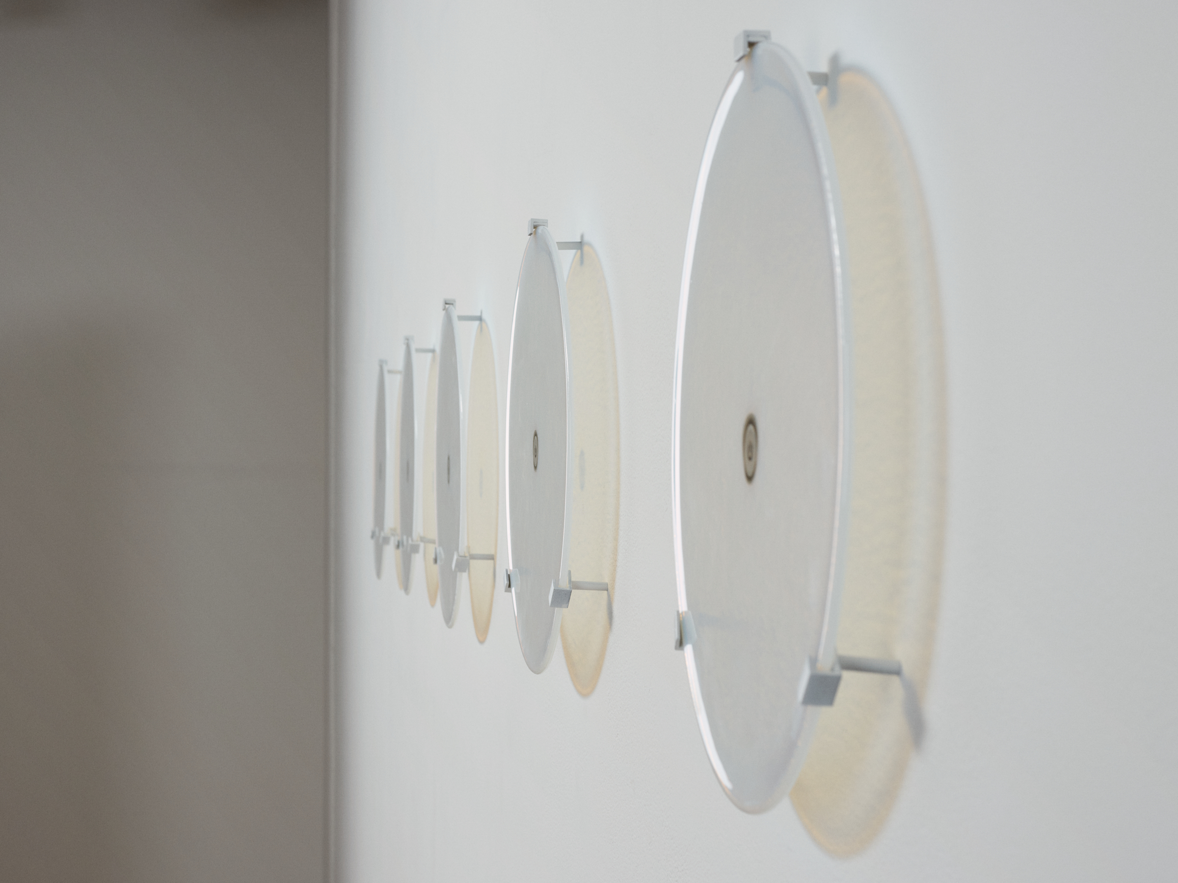 Gallery Installation created with three circular shapes mounted in a horizontal line