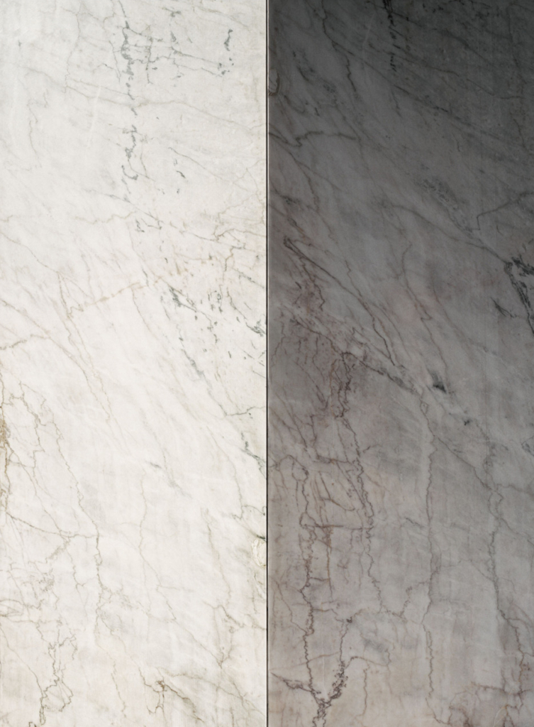 a minimalist photograph of marble walls