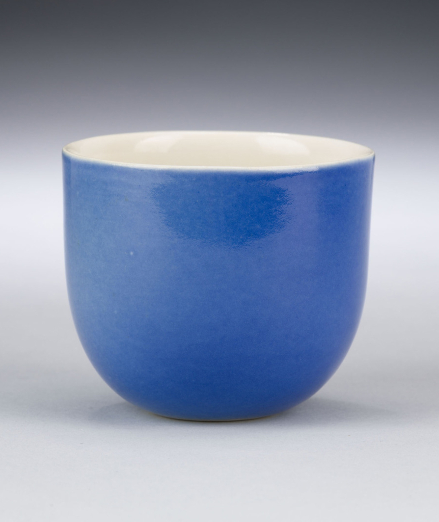 a blue cup by Lietzke Porcelains