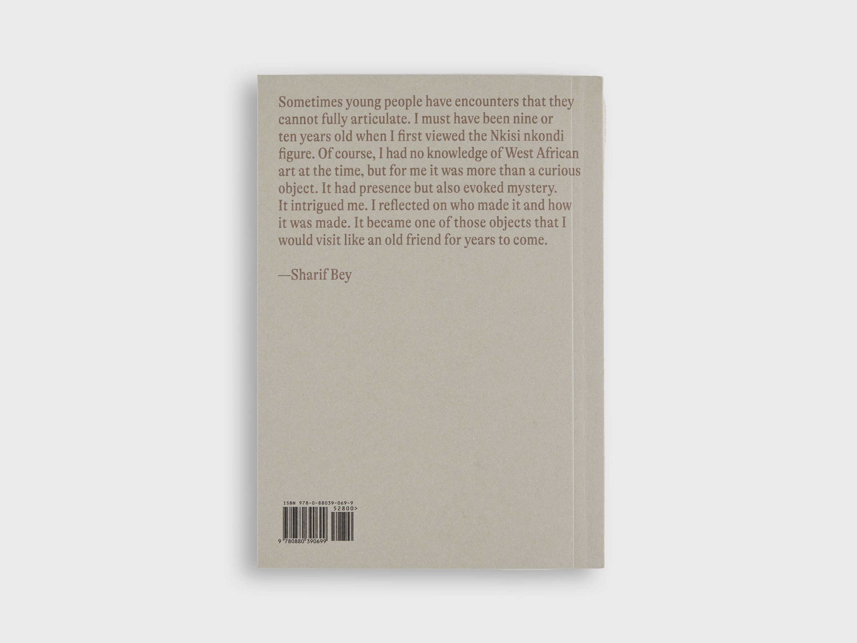 A book against a grey background