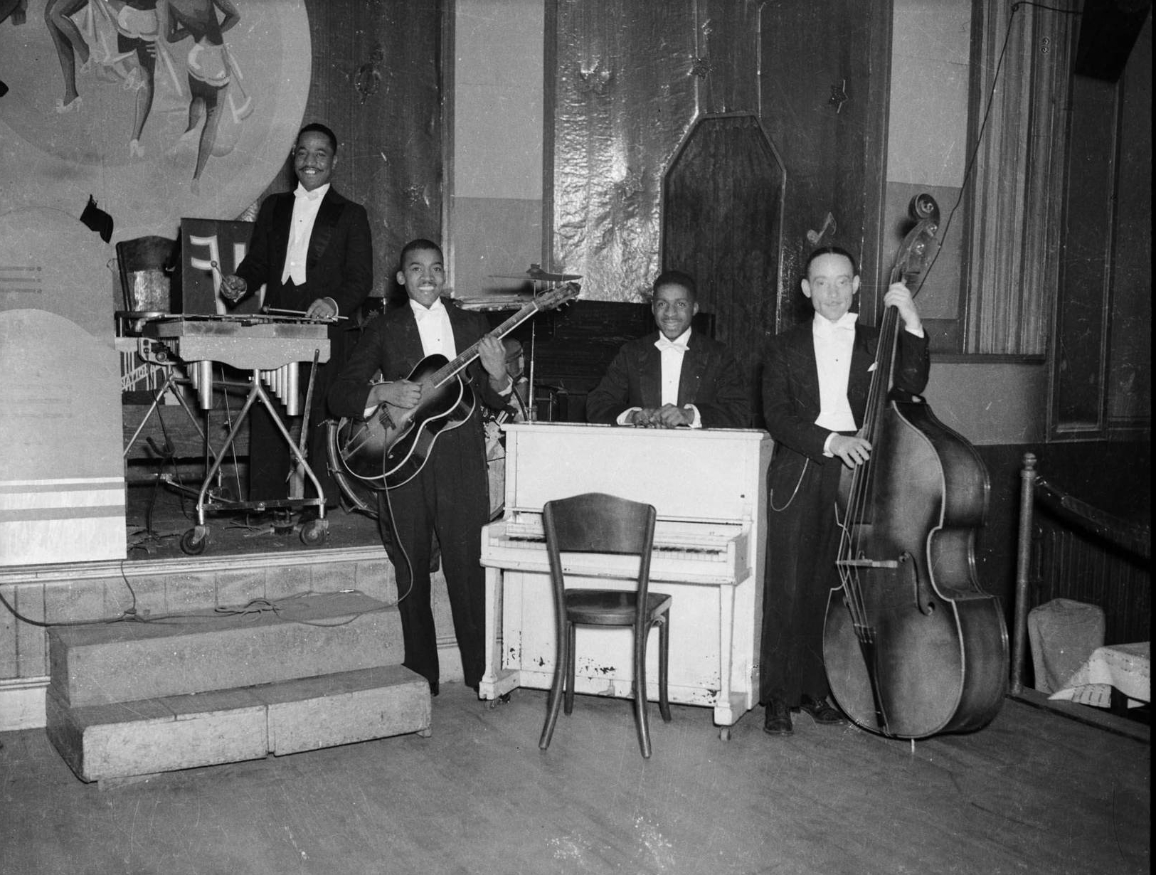 Men playing jazz on stage
