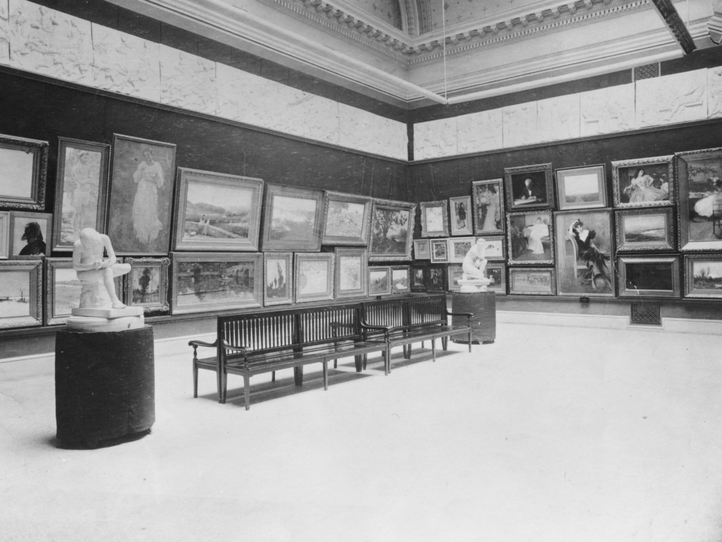 View of the first Carnegie International in 1896 showing various paintings