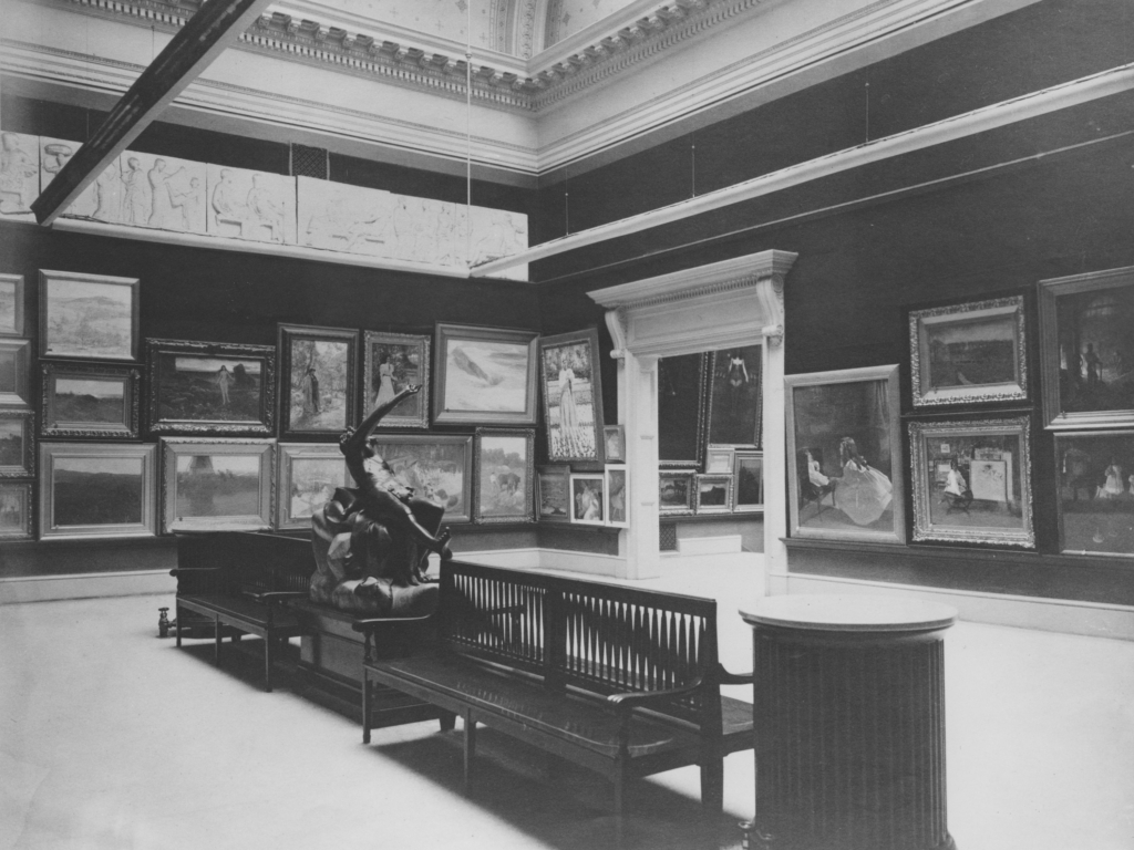 View of the first Carnegie International in 1898 showing various paintings