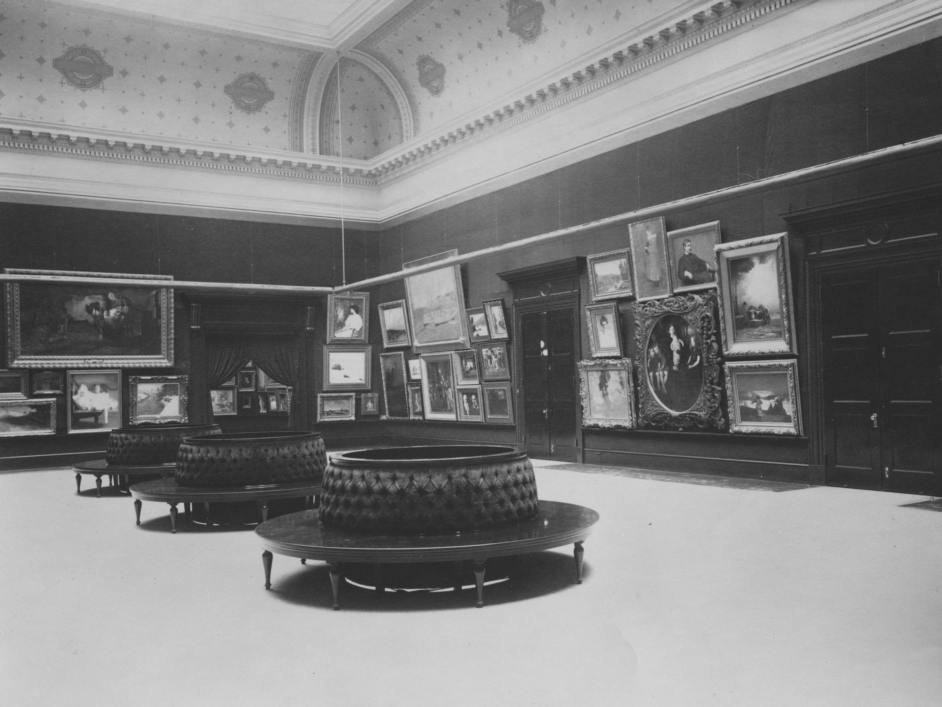 View of the first Carnegie International in 1899 showing various paintings