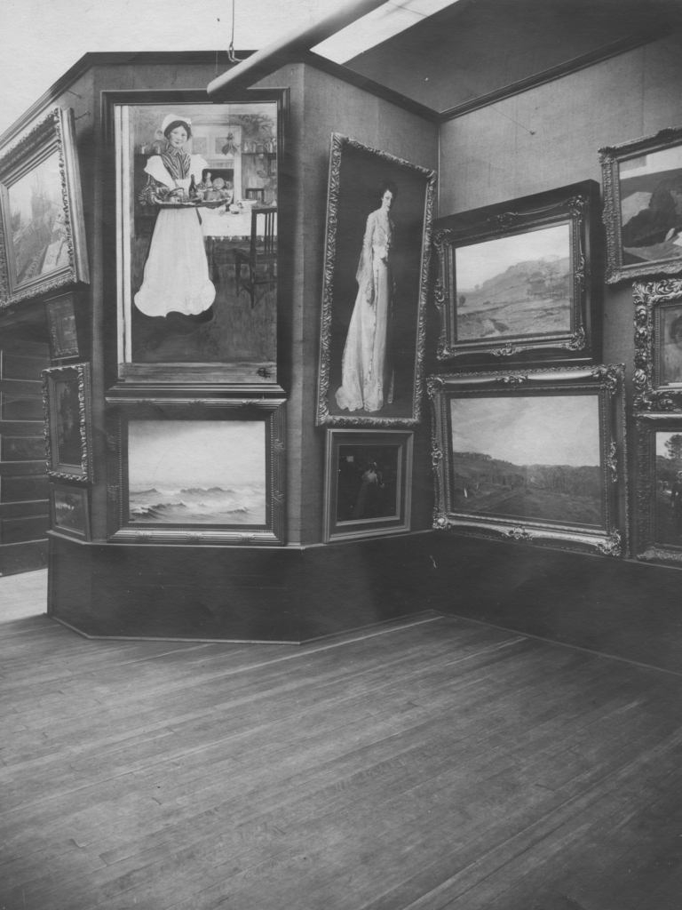 View of the first Carnegie International in 1904 showing various paintings