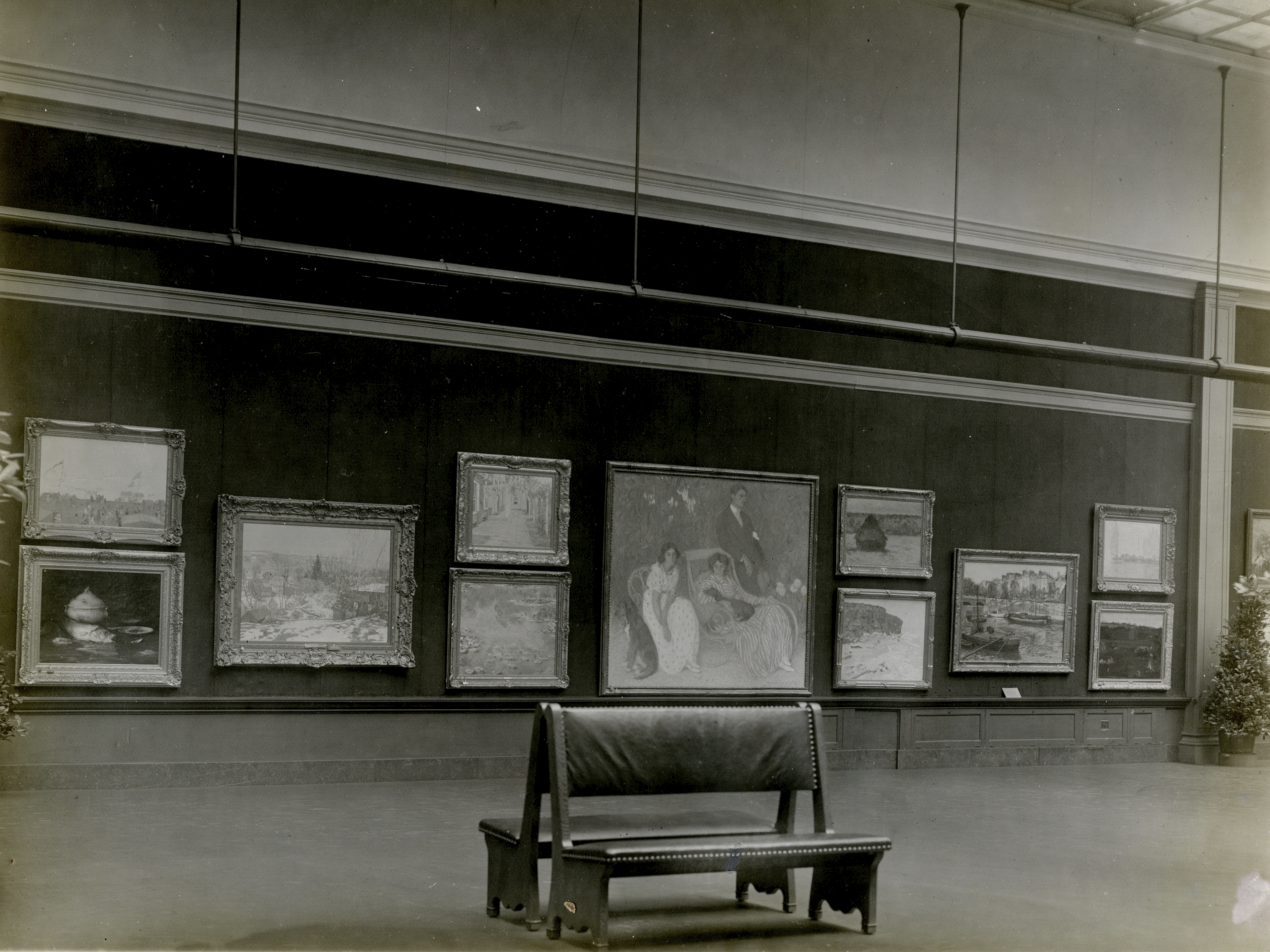 View of the first Carnegie International in 1914 showing various paintings
