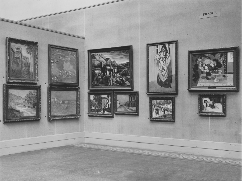 View of the first Carnegie International in 1927 showing various paintings