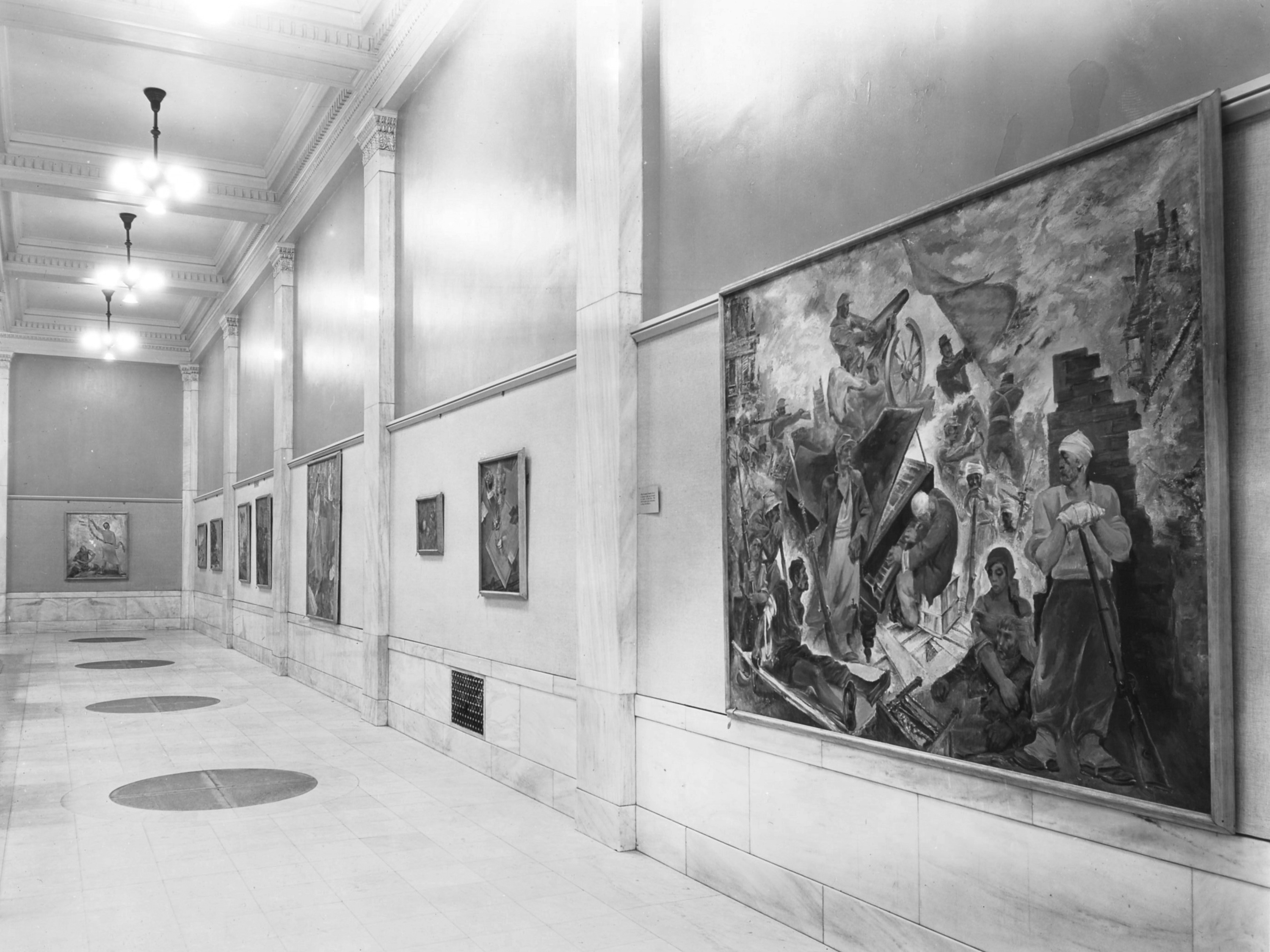 View of the first Carnegie International in 1930 showing various paintings