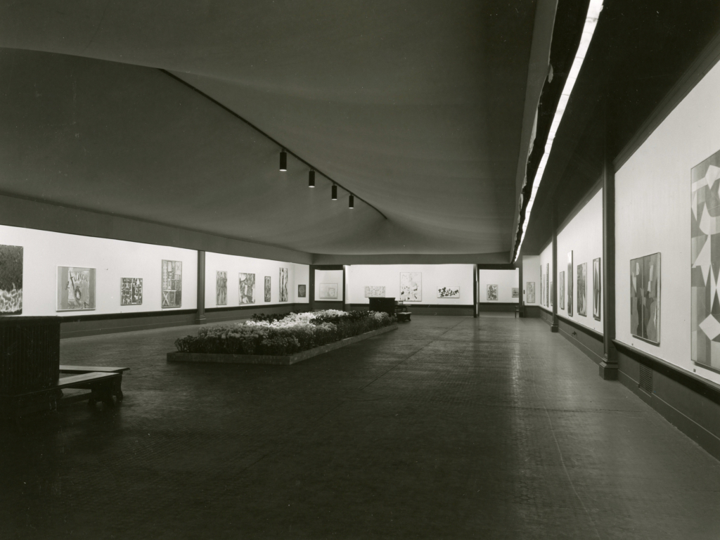 View of the first Carnegie International in 1955 showing various paintings