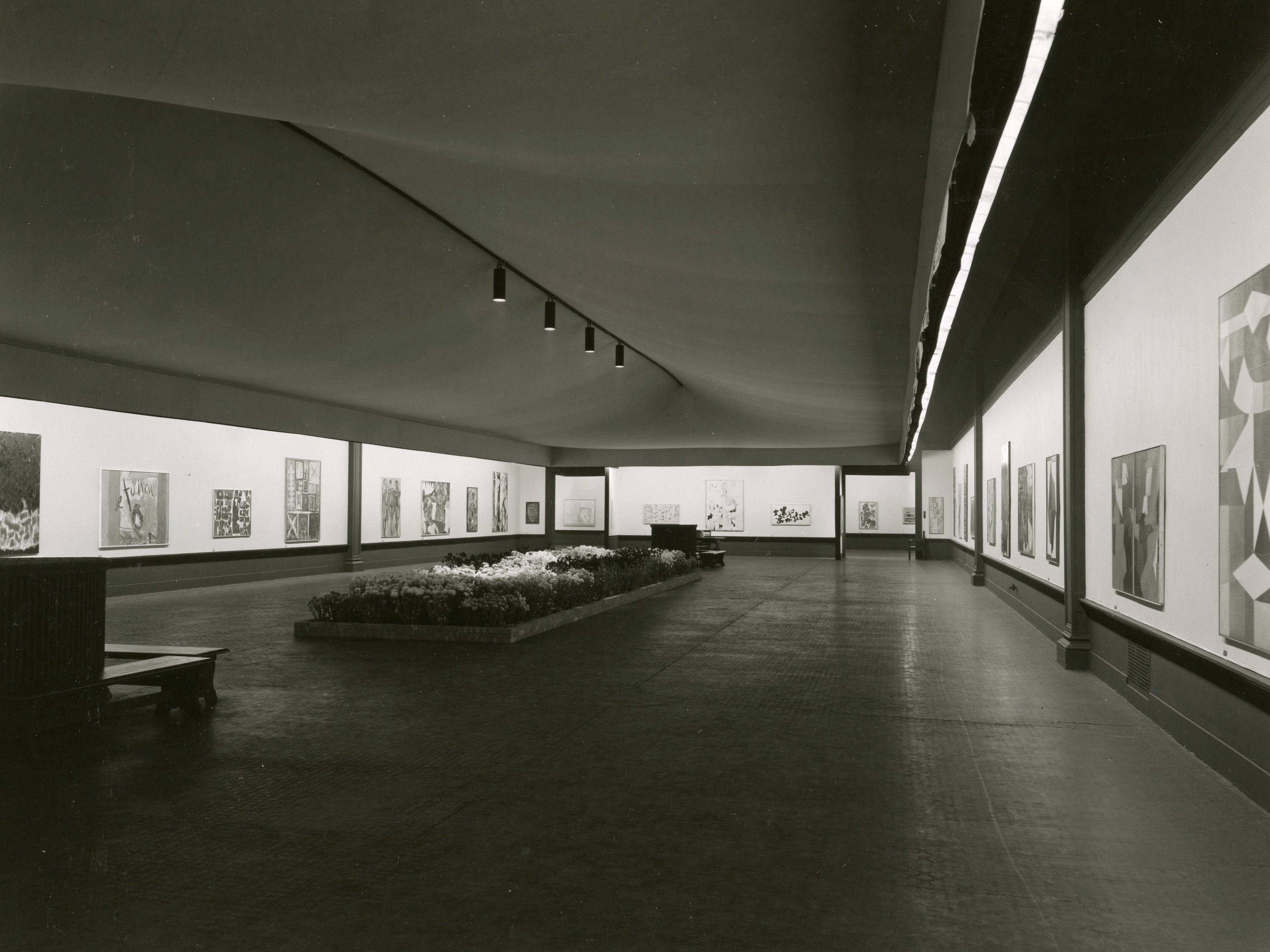 View of the first Carnegie International in 1955 showing various paintings