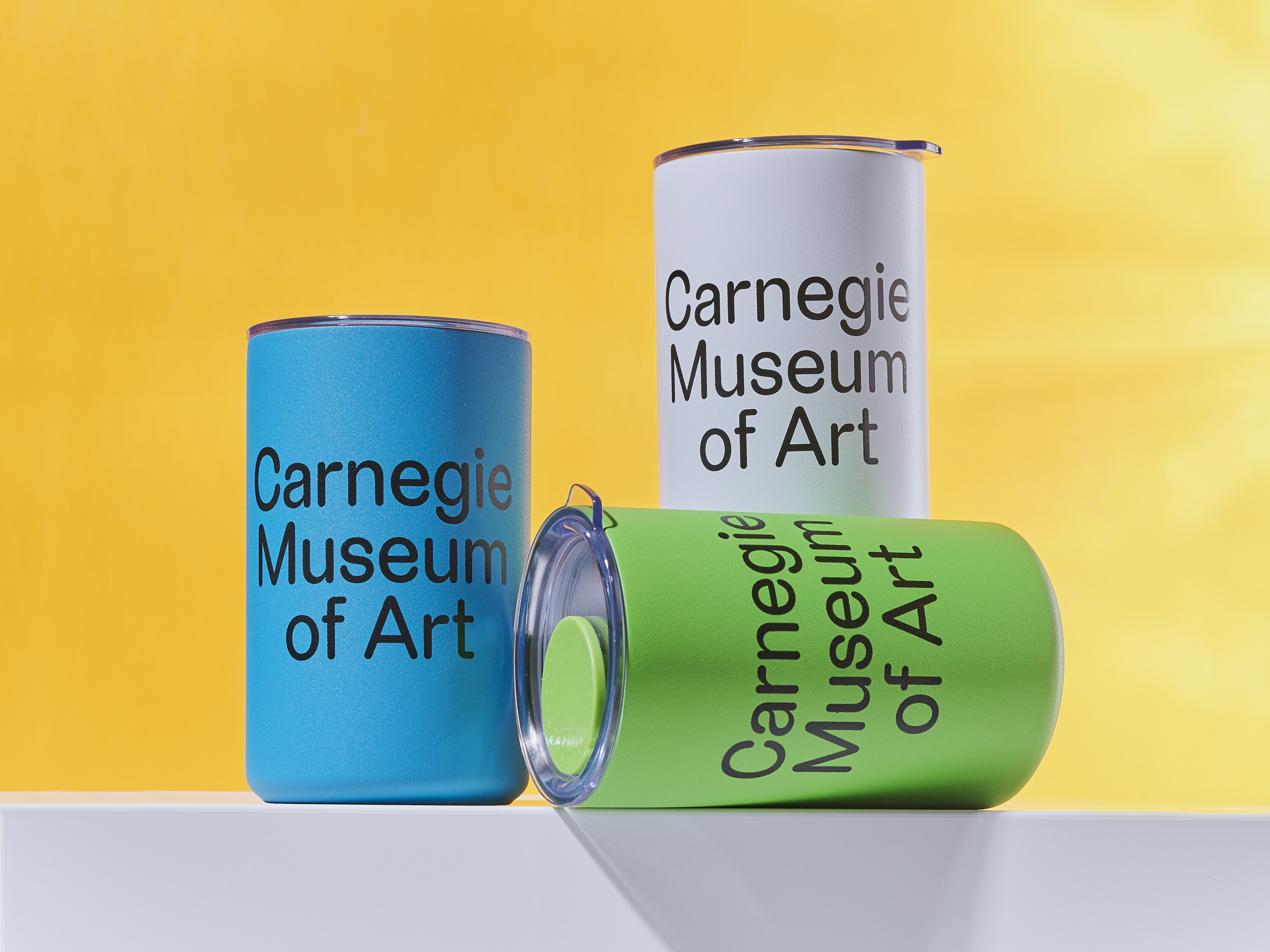 cups using the new Carnegie museum of art branding
