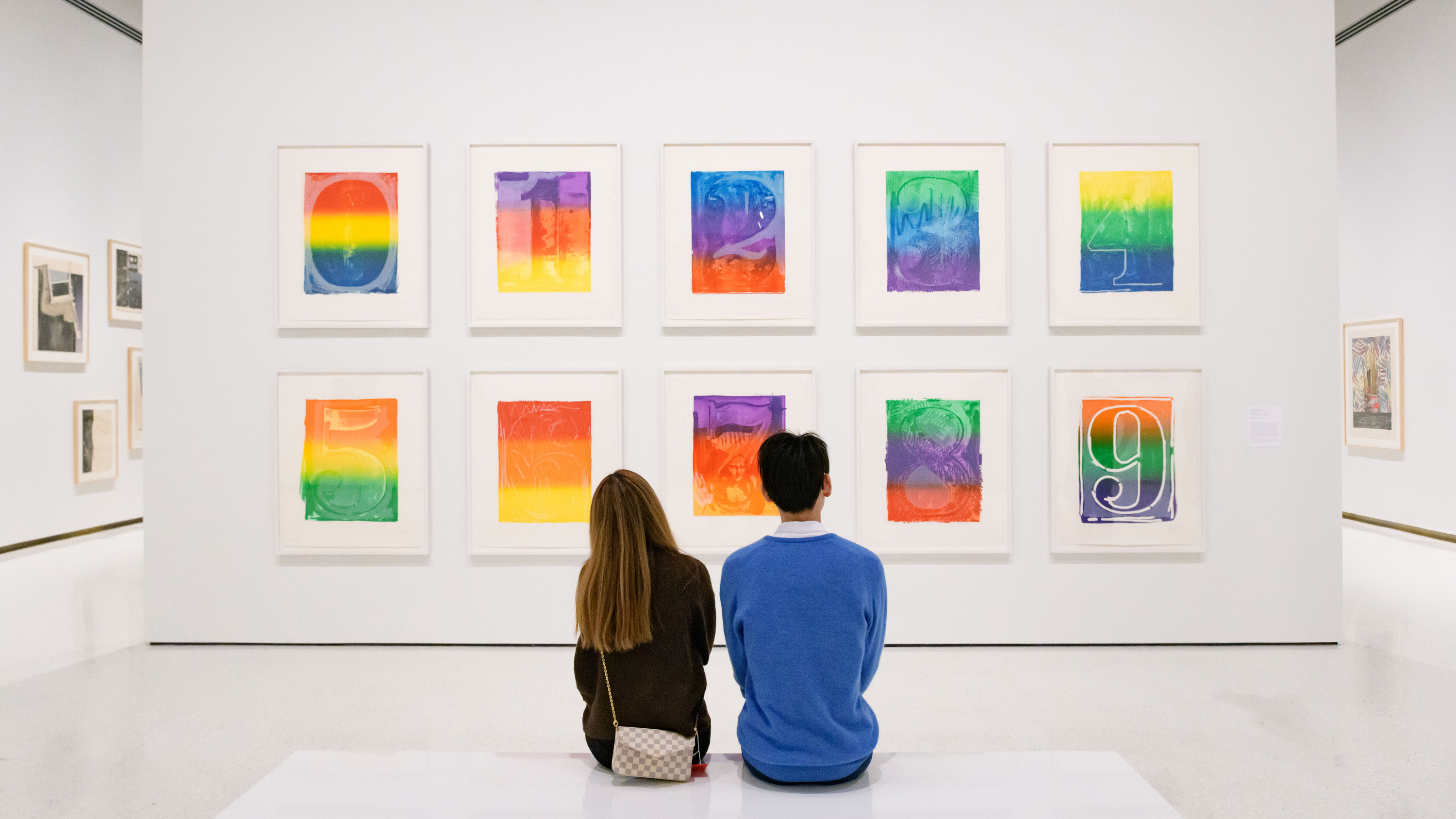 Two people viewing Jasper Johns Prints