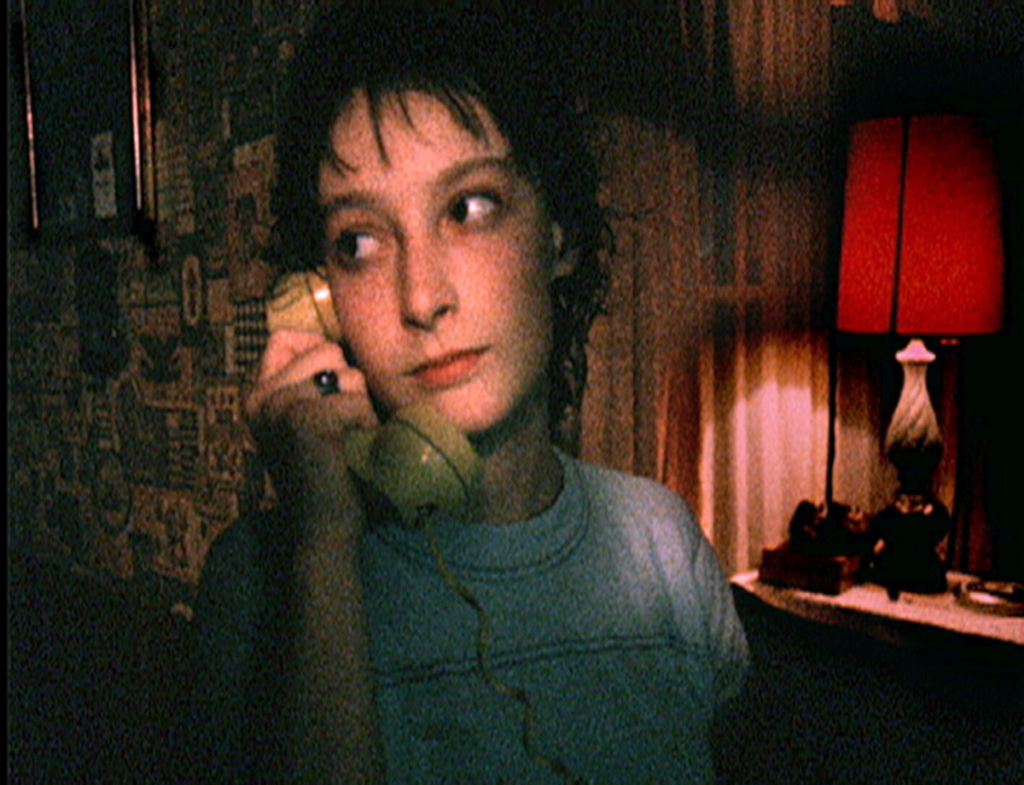 Still from Seventeen in which a woman is talking the phone