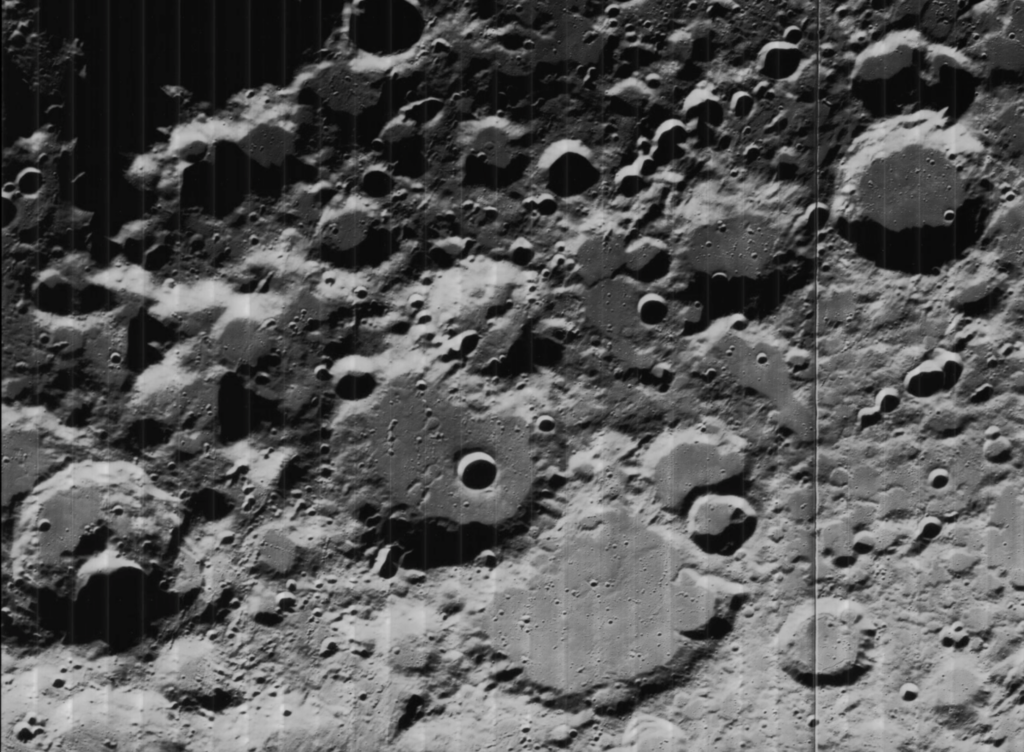a photo of the moon featuring various craters and Marias