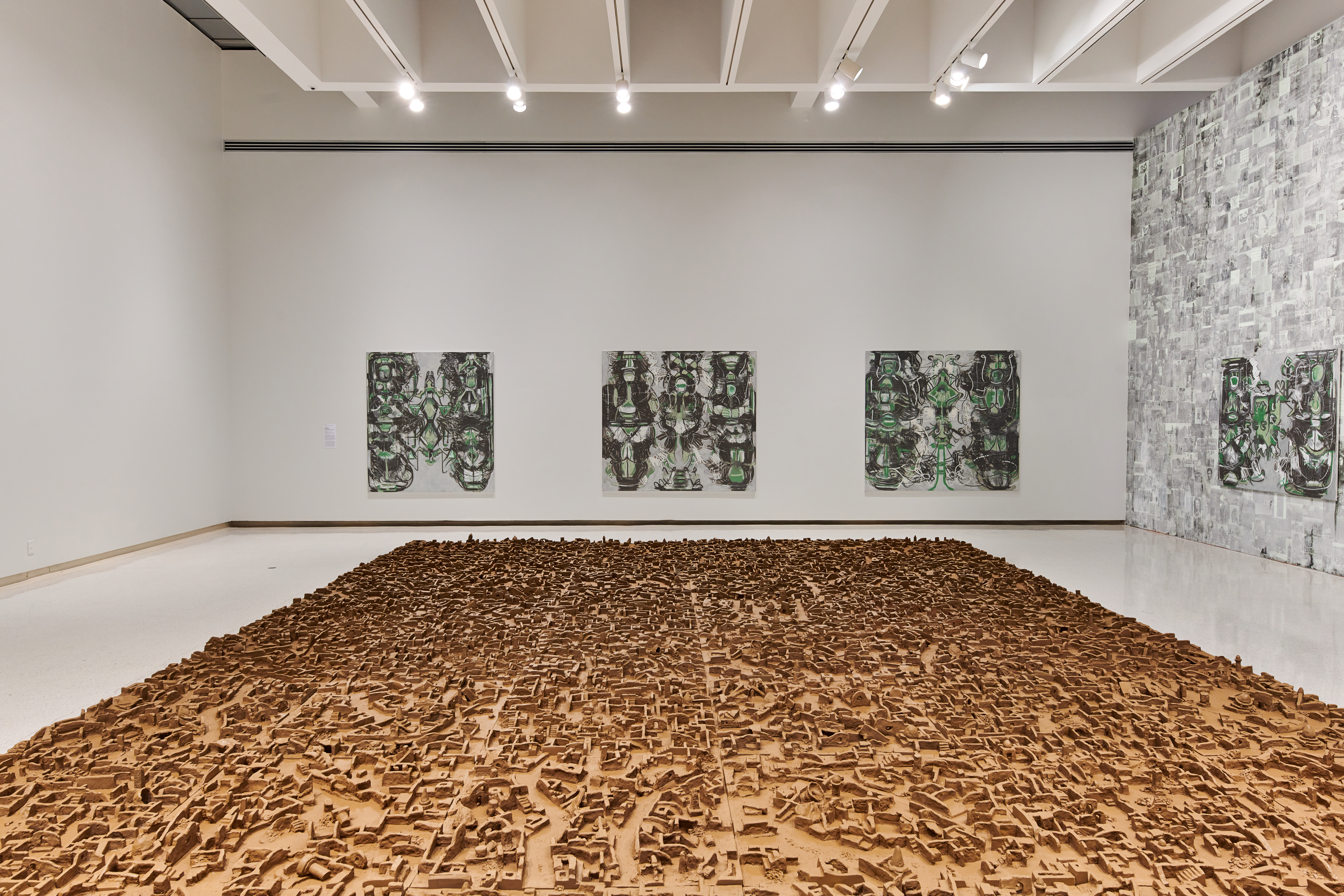 Installation view of the 58th Carnegie International featuring works by Dia al-Azzawi and Melike Kara