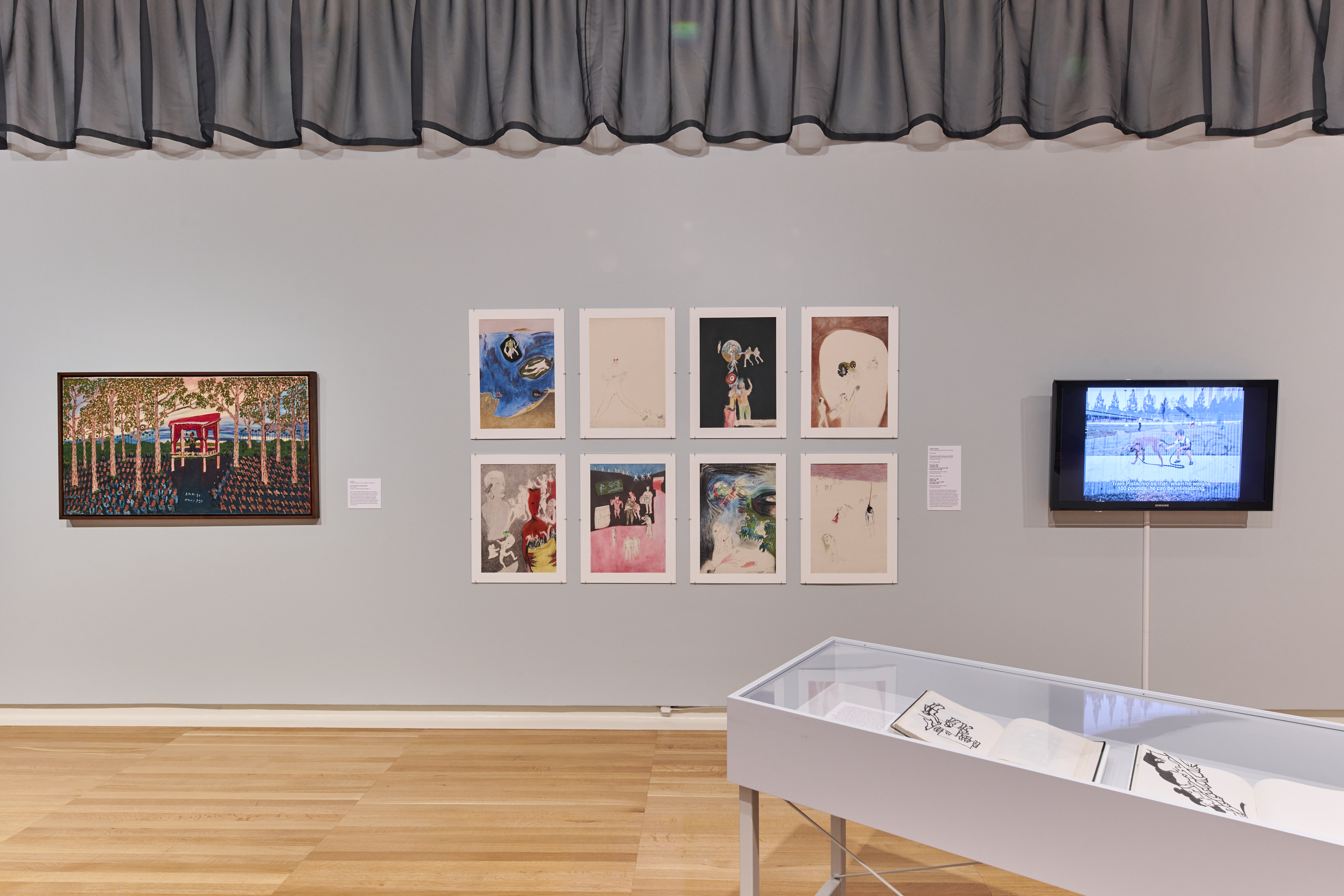 photo of various works of art within Scaiffe gallery: Installation view of Refractions in the 58th Carnegie International, featuring works by Svay Ken (left) and Isabel De Obaldía (center and right), Courtesy of Carnegie Museum of Art; photo: Sean Eaton