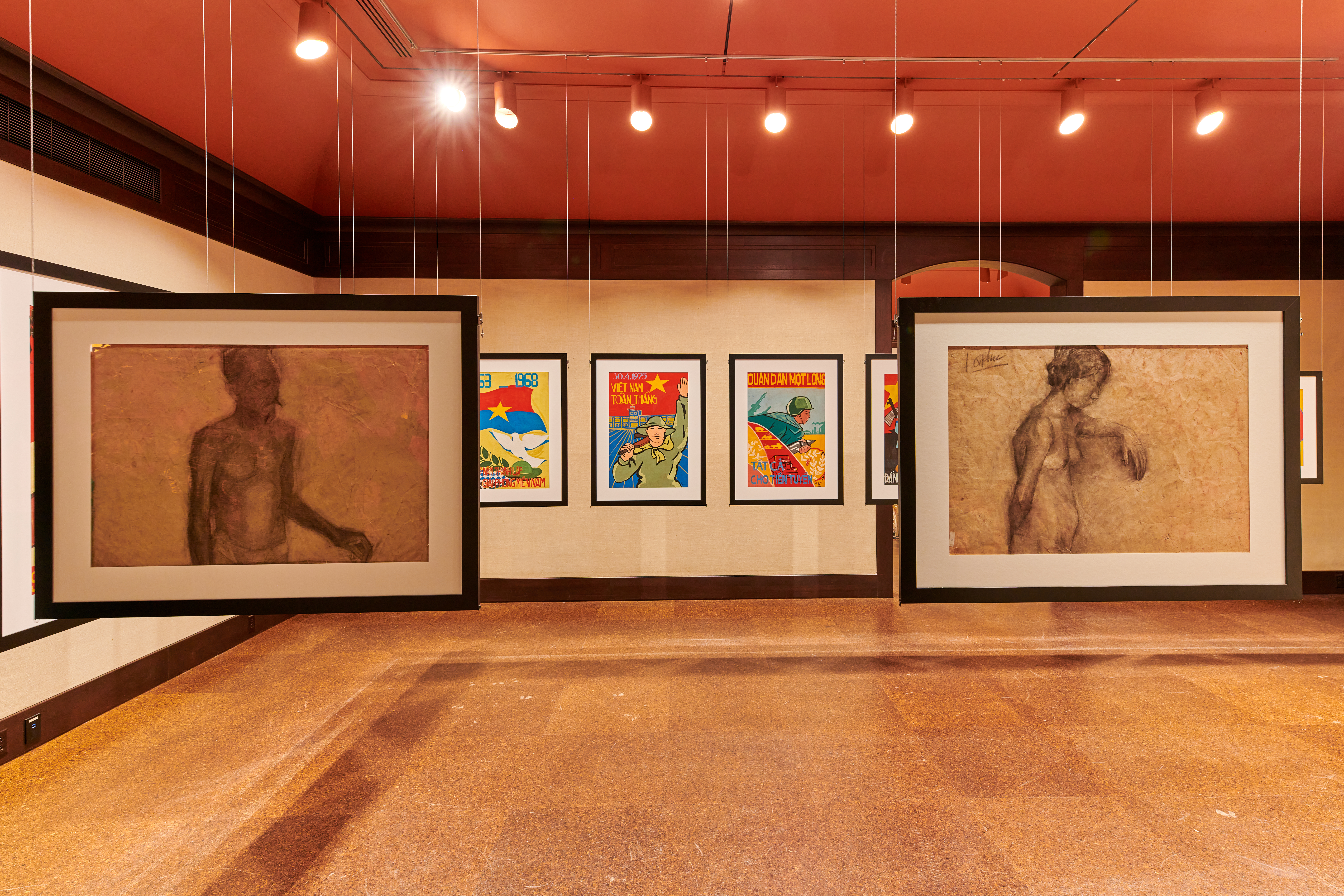 Installation view of the 58th Carnegie International featuring posters from the Dogma Collection
