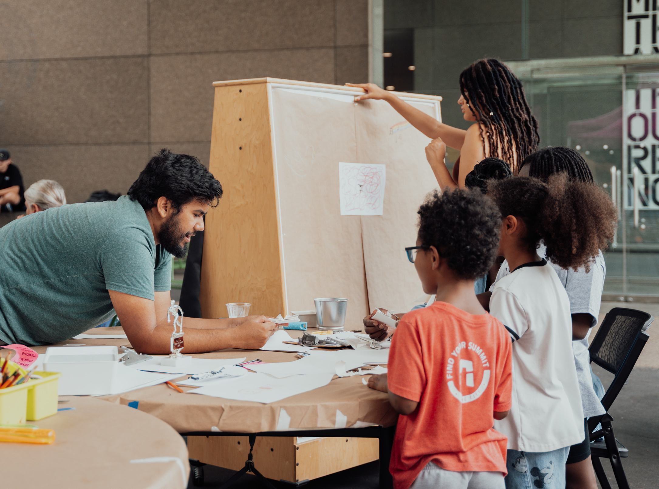 people drawing at an inside out event