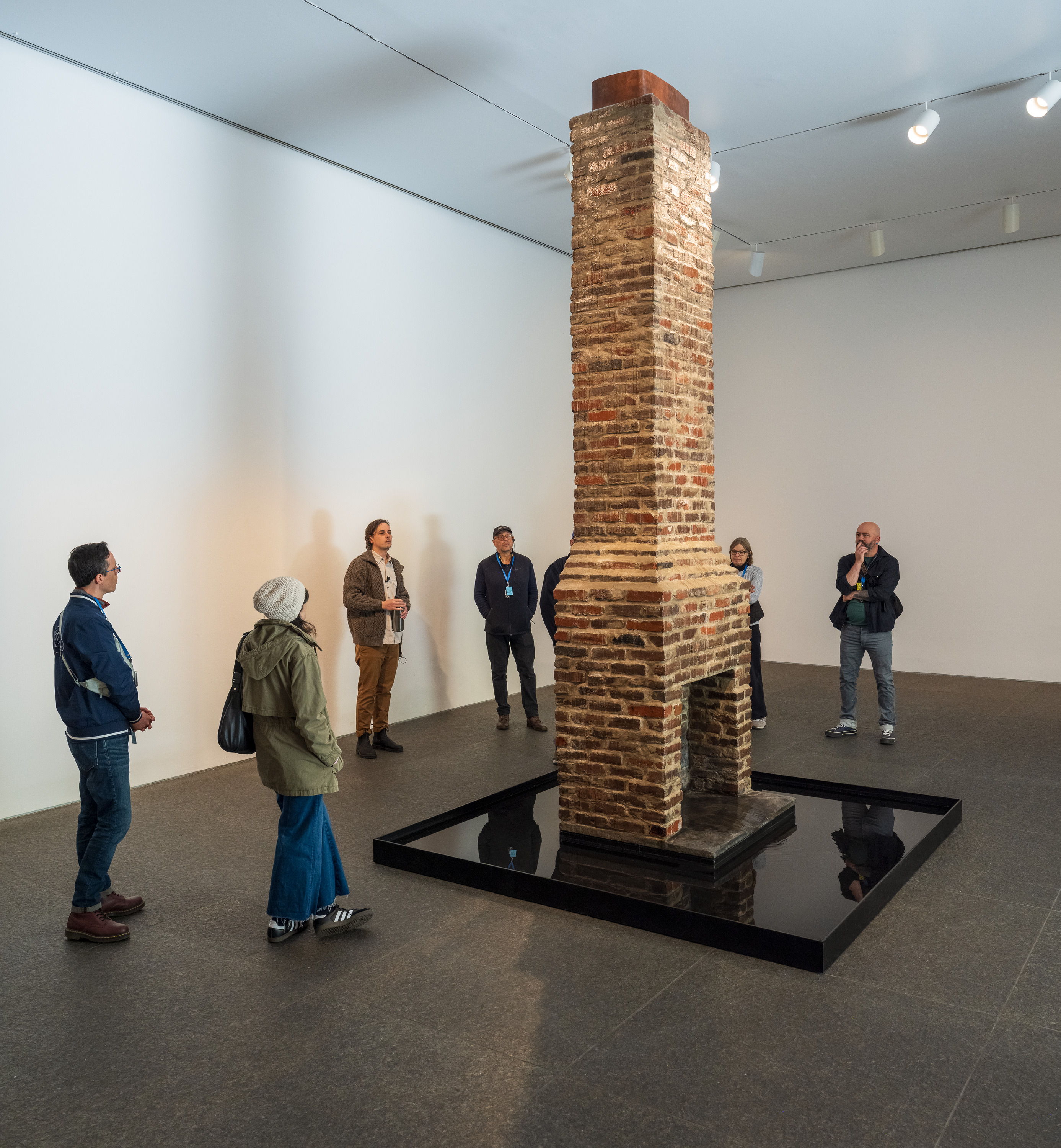 people standing around an chimney in forum gallery
