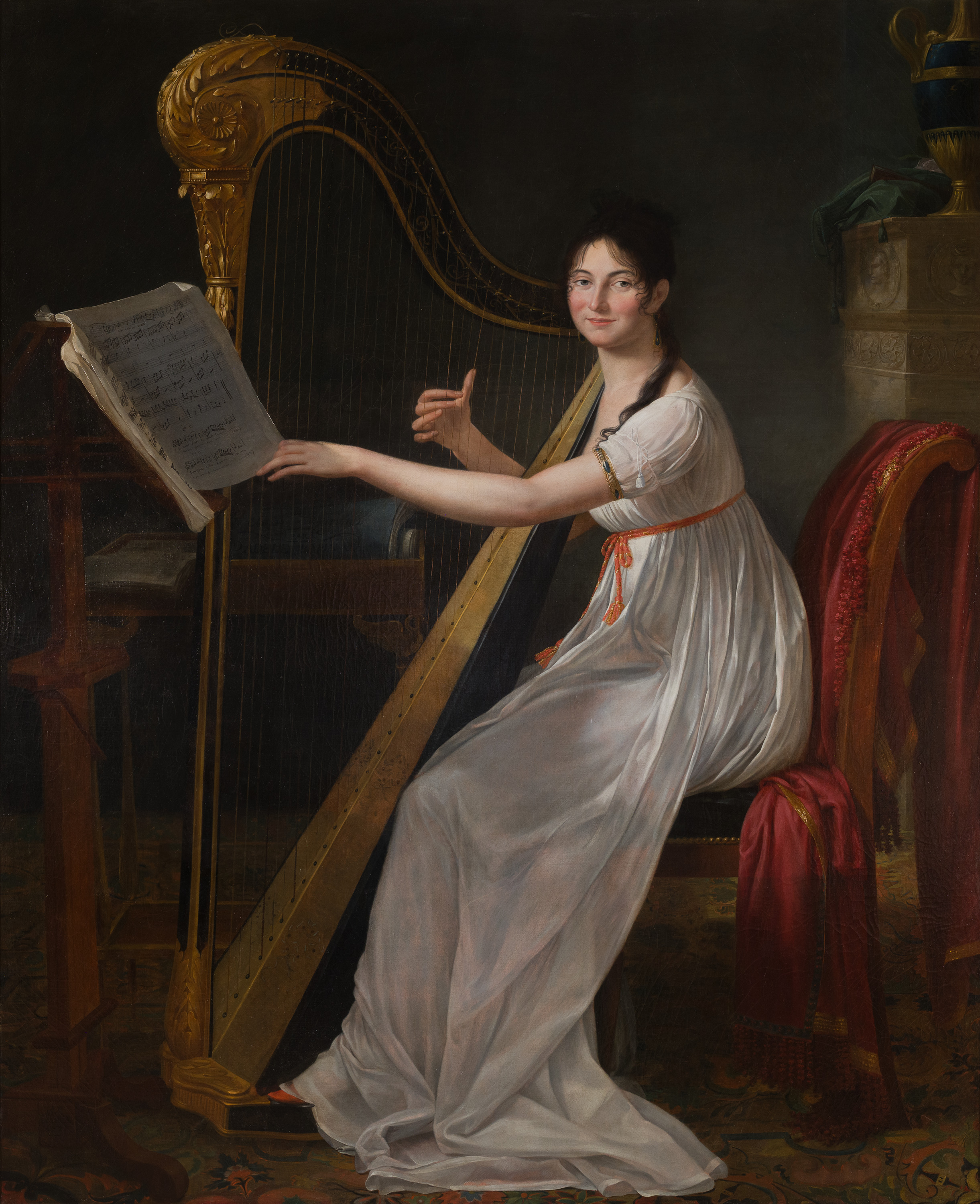 girl strumming a harp
