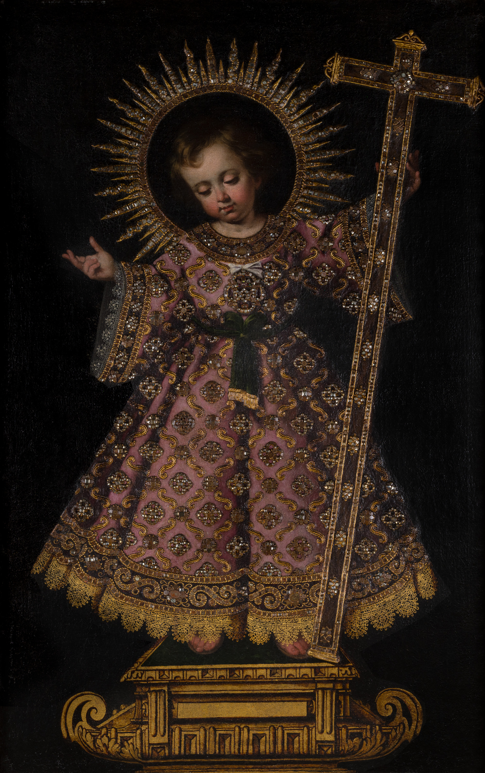 painting of the christ child holding a cross