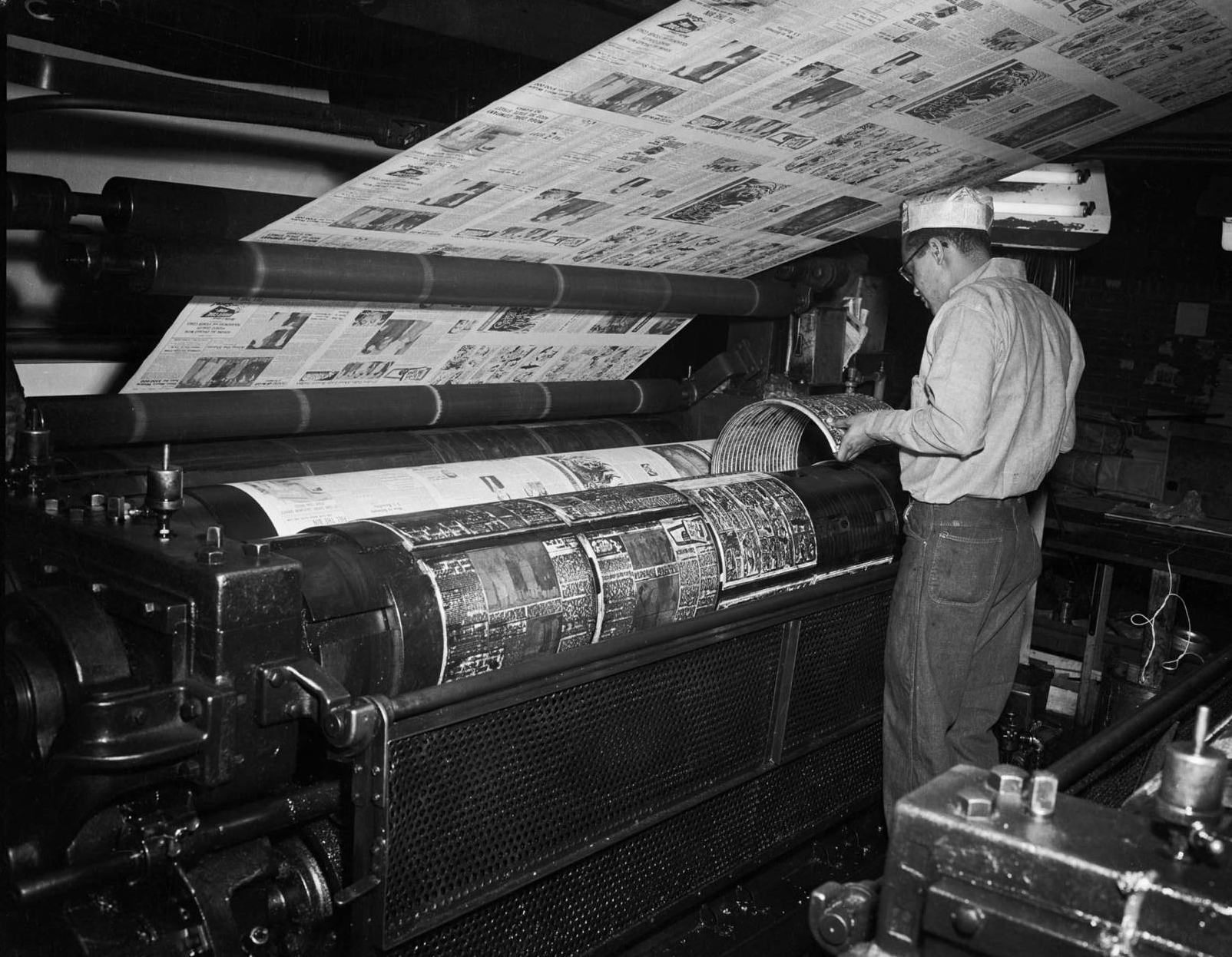 a man at a newspaper plant