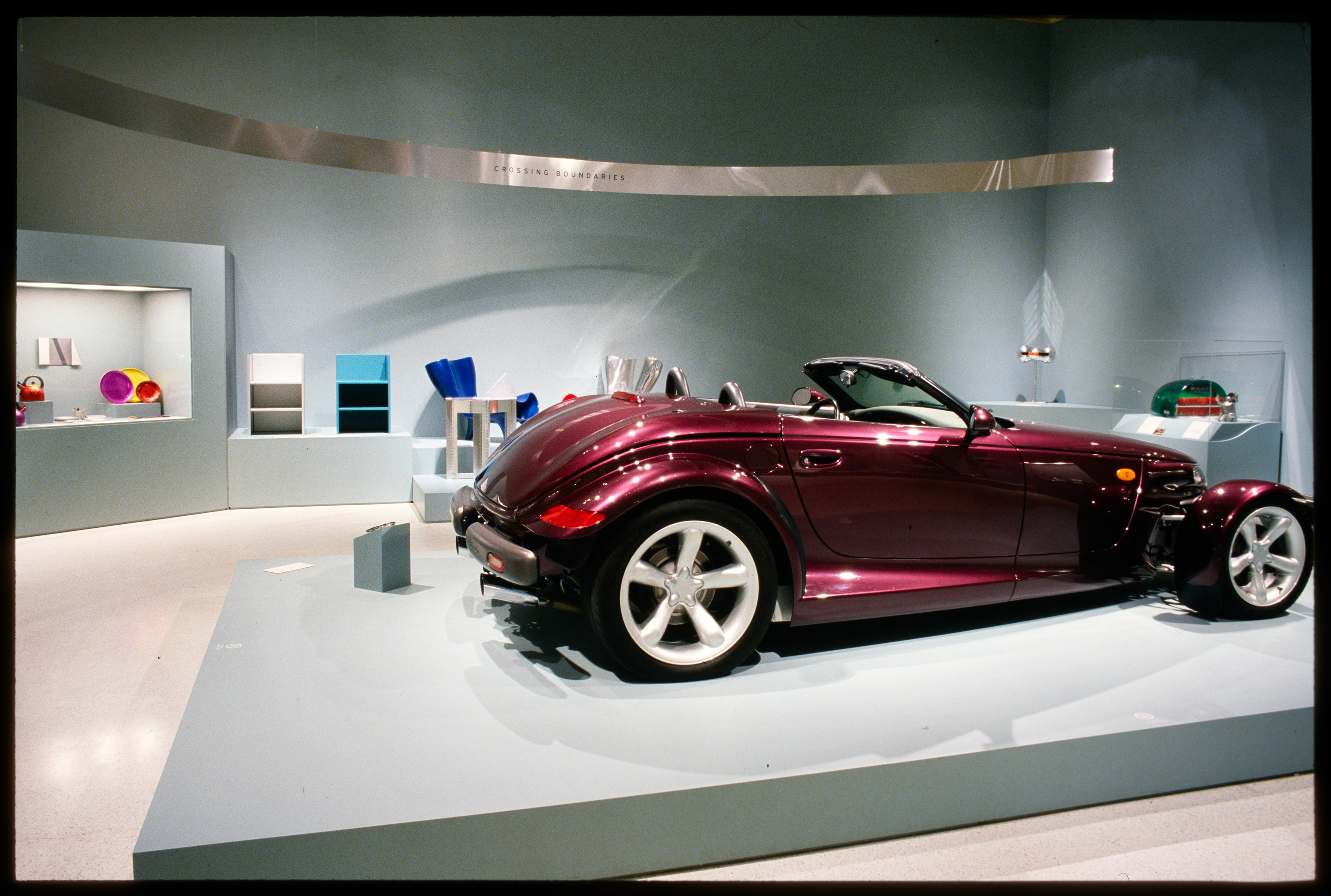 Installation view of Aluminum by Design: Jewelry to Jets 2000 featuring a car