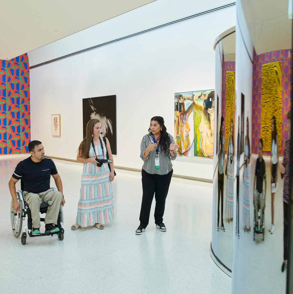 museum visitors observing art at the museum