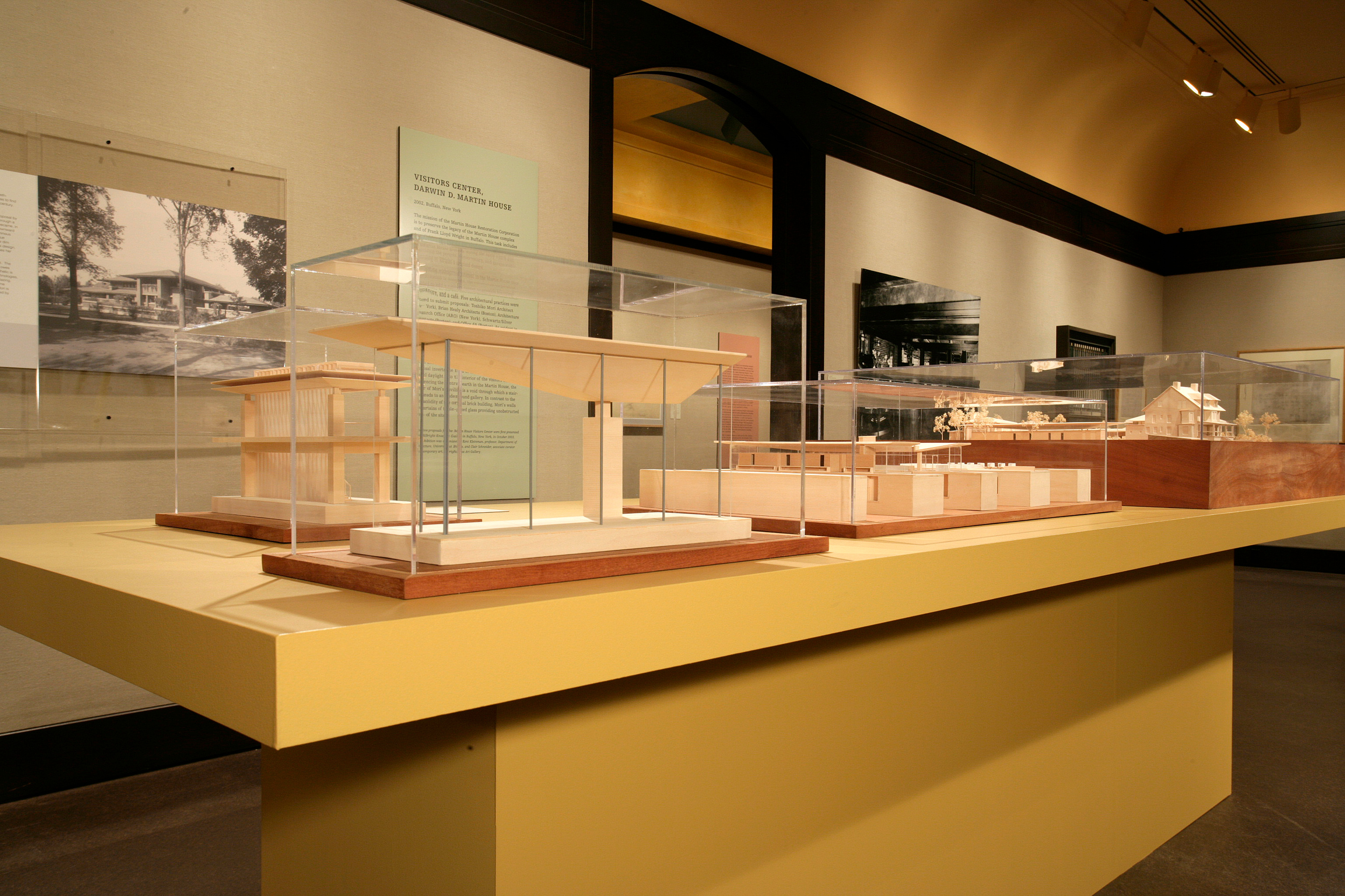 inside of Frank Lloyd Wright exhibition in heinz gallery featuring many miniature dioramas