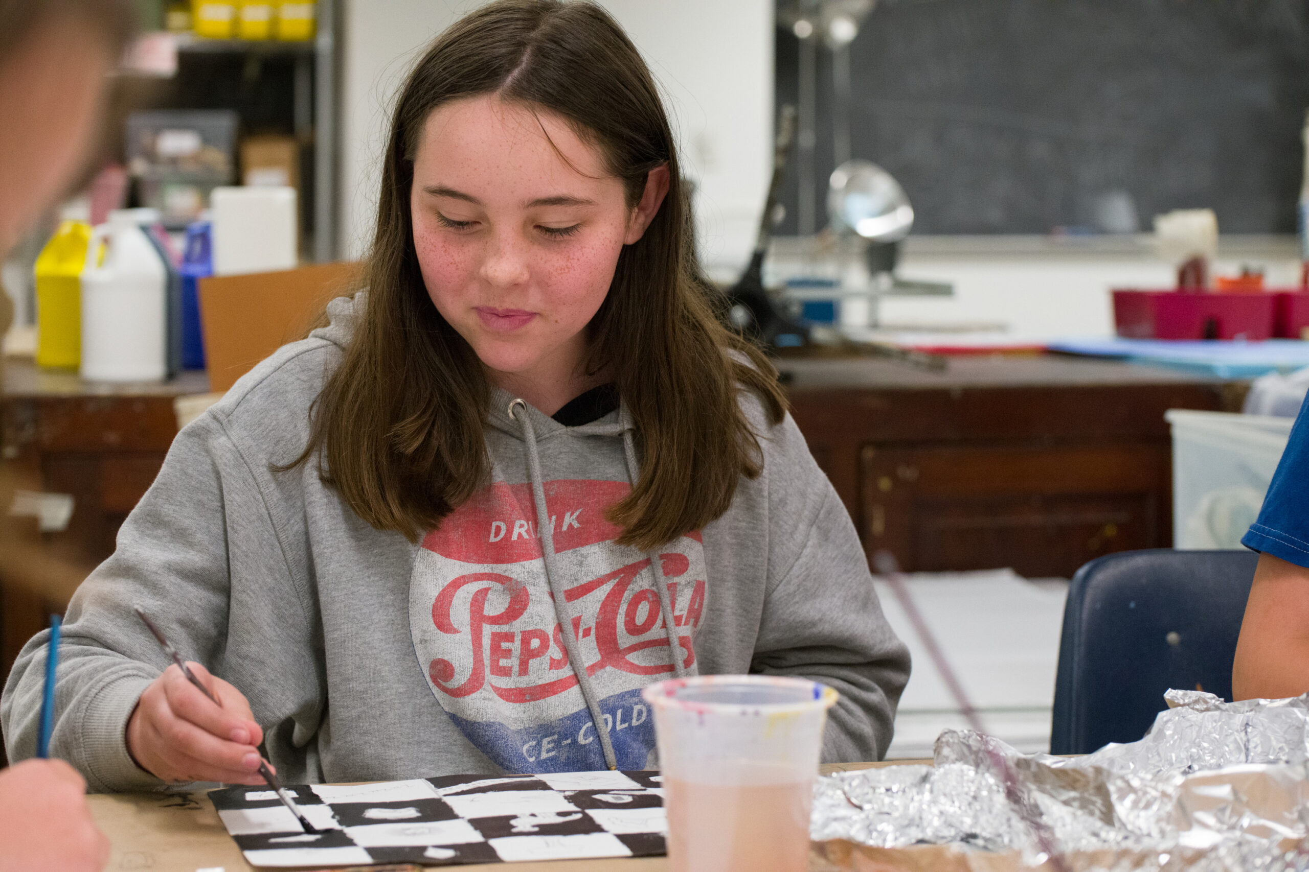summer camp attendee painting
