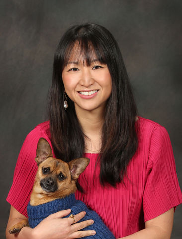 person holding a dog