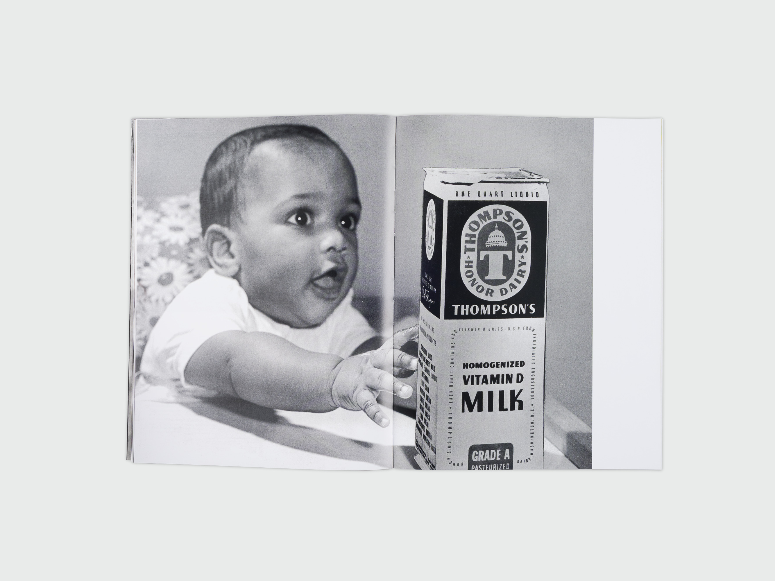 baby reaching for Thompsons brand dairy milk
