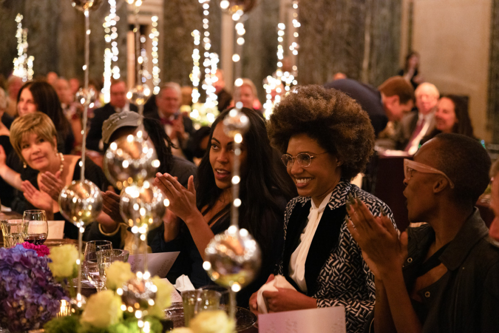 people sitting at a dinner table