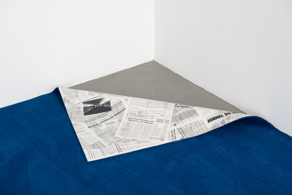 table with table cloth folder up at a corner