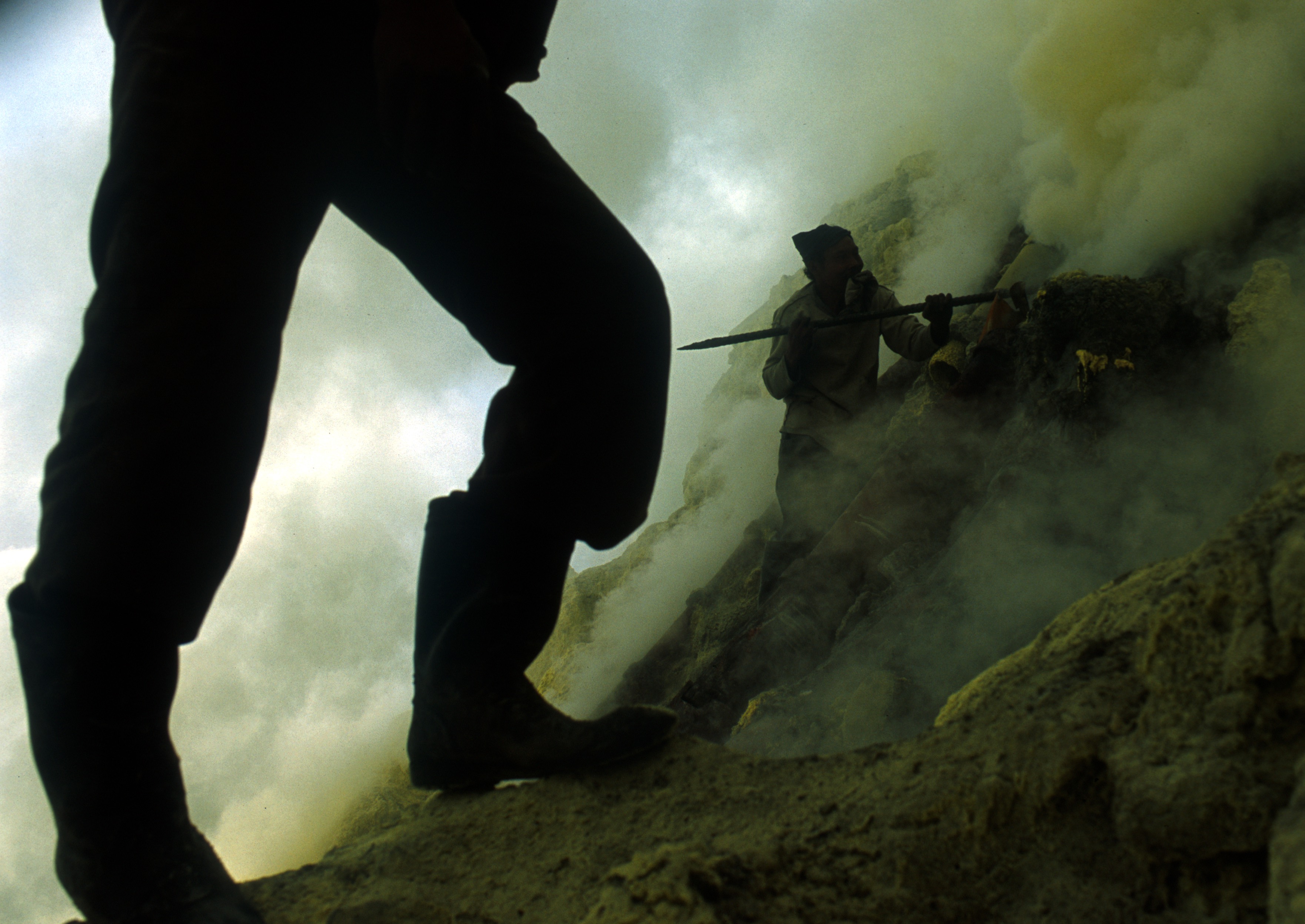 a still from a movie of people working.